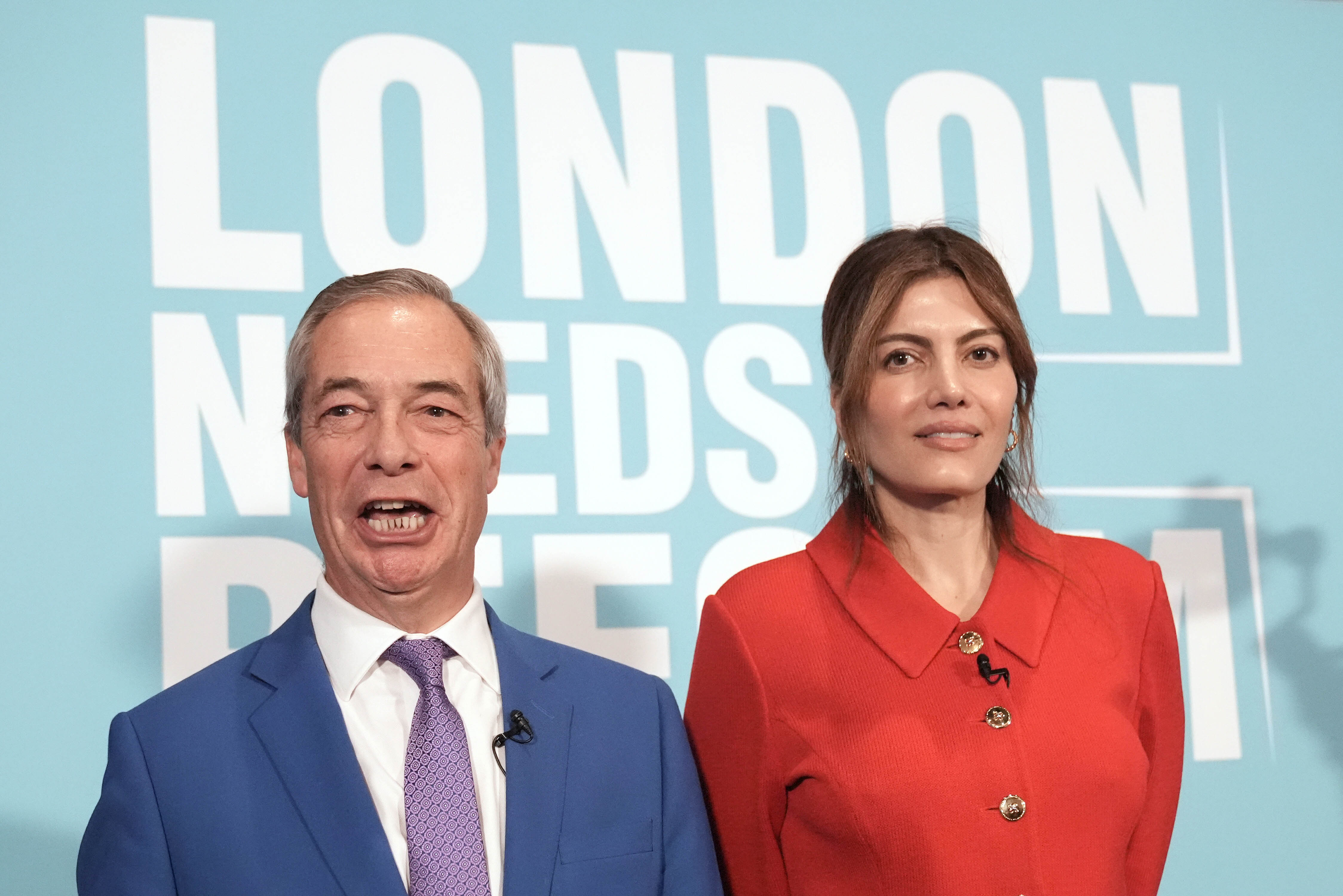 <p>Nigel Farage and stand in front of a banner reading ‘London needs Reform’</p>