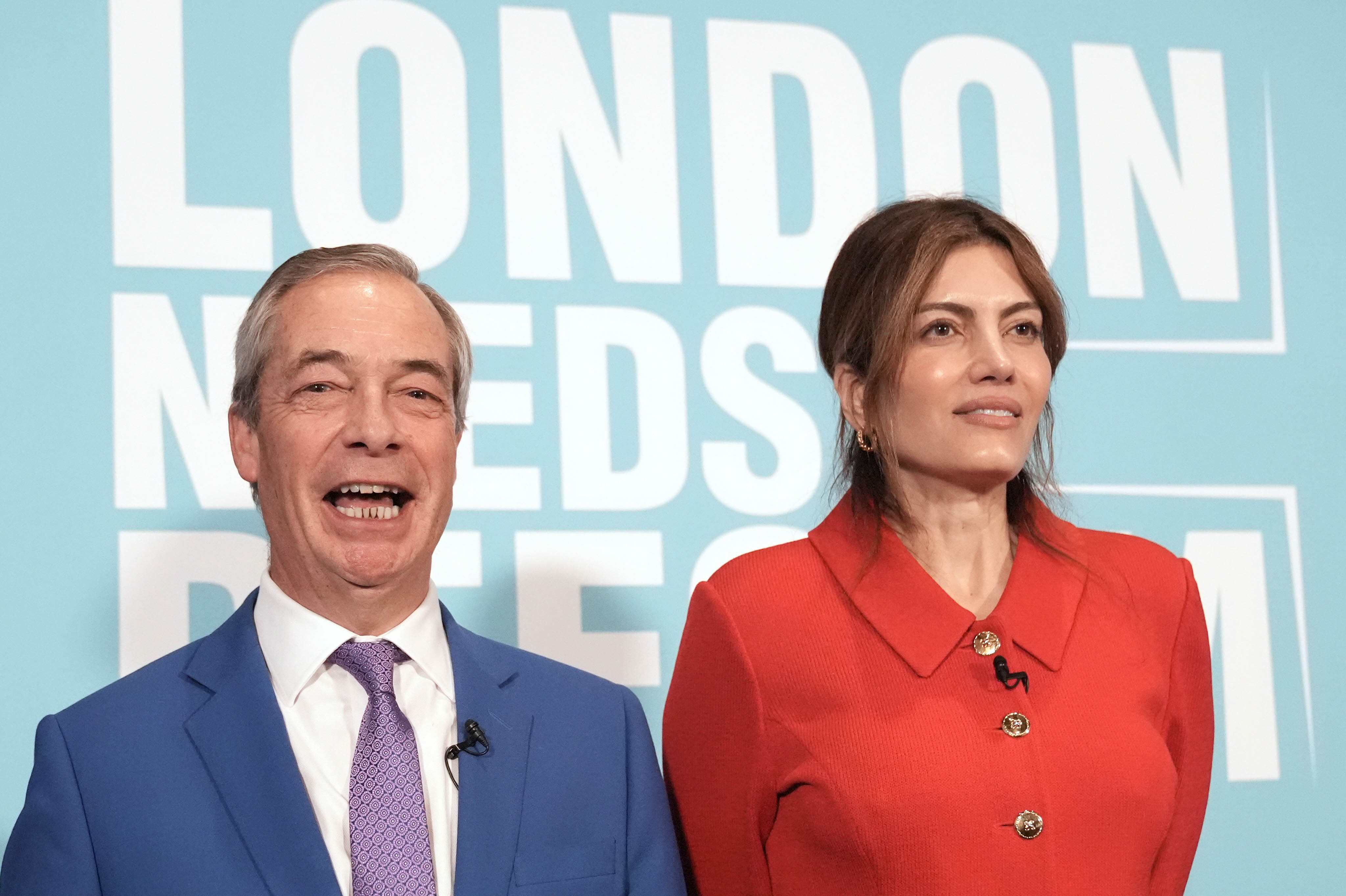 Nigel Farage and stand in front of a banner reading ‘London needs Reform’