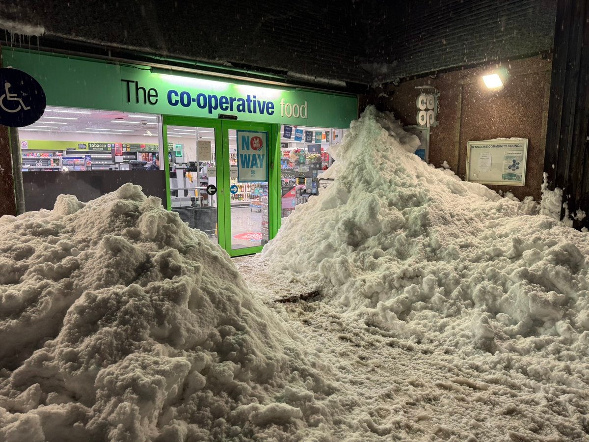 Snow piling up outside the local Co-Op in Insch on Tuesday
