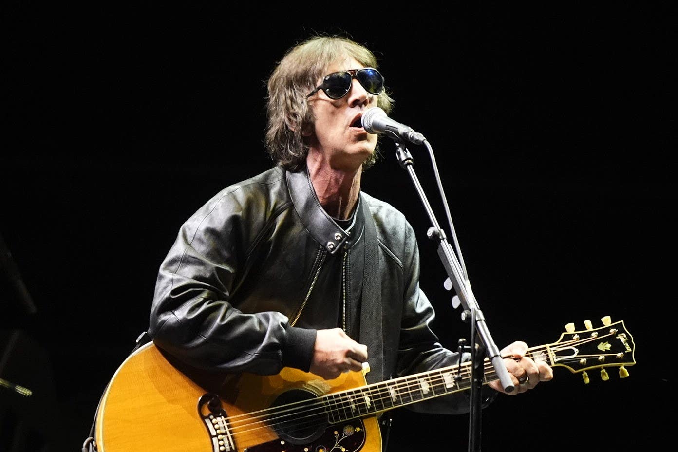 <p>Richard Ashcroft on stage in Cardiff (Jordan Pettitt/PA)</p>
