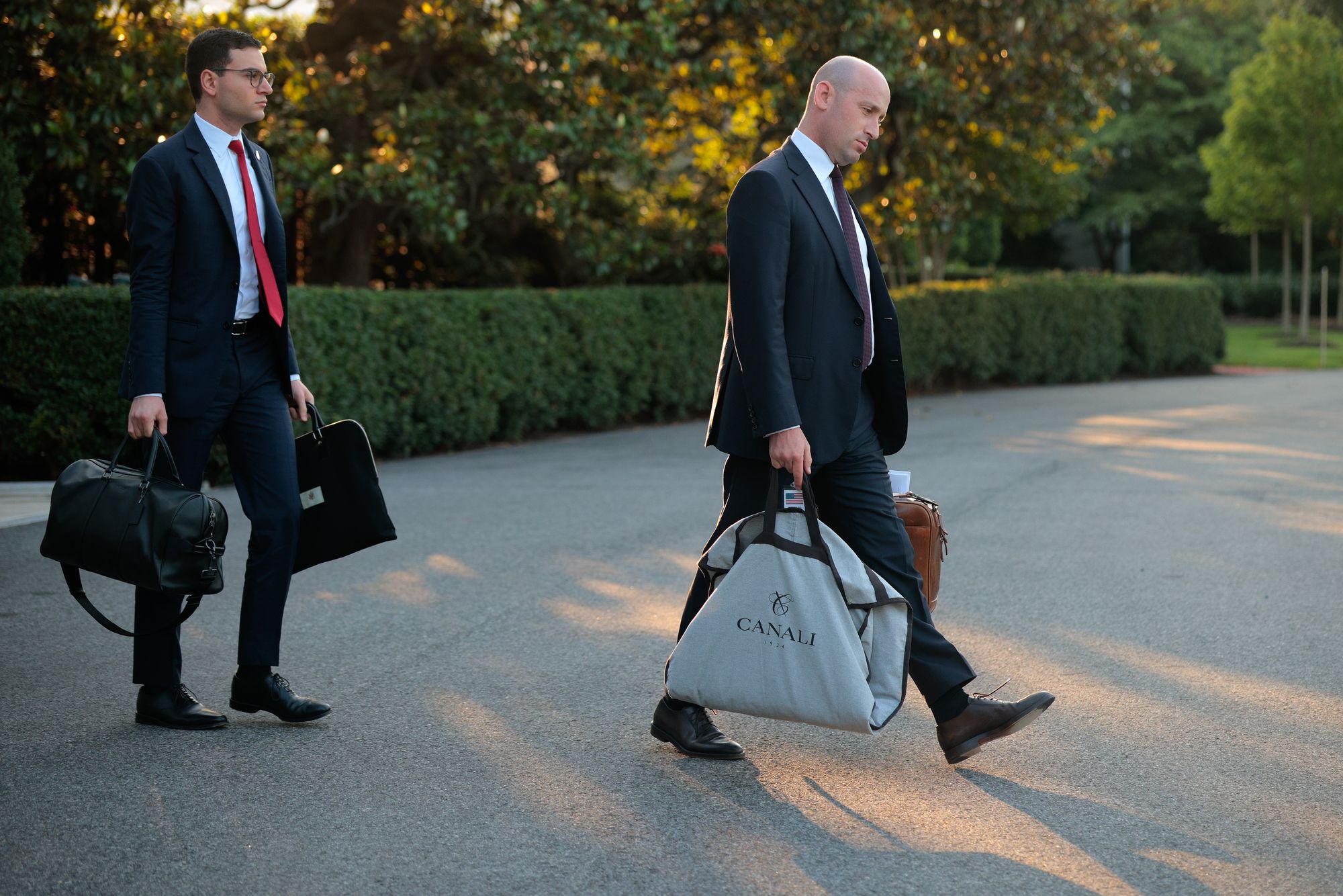 'We would talk about the difference in fabrics for seasons, and lapel size and width of ties and these types of things,' a former Trump official said of Miller