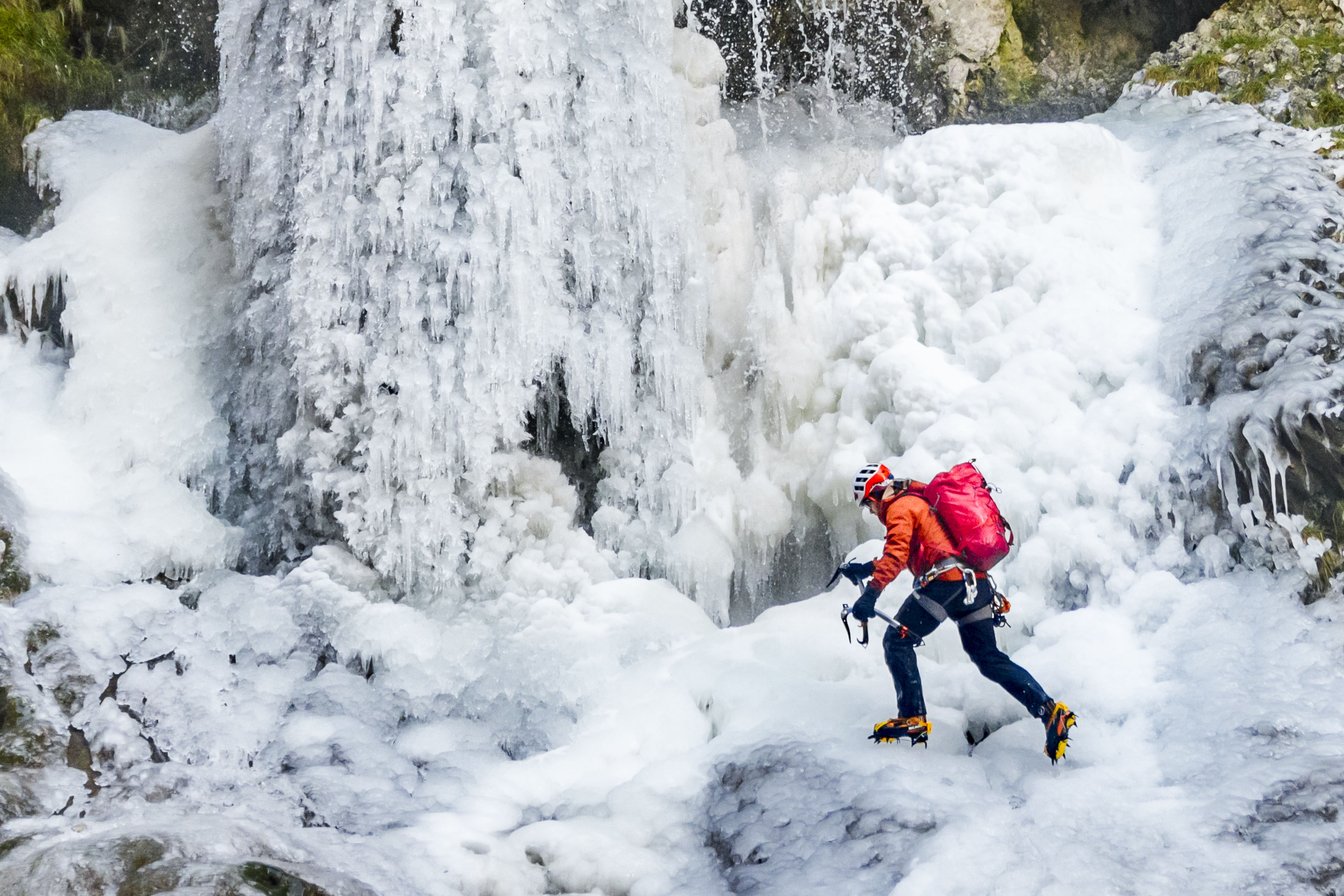 Mick Ellerton scaled a frozen waterfall in the Yorkshire Dales National Park as temperatures plummeted (Danny Lawson/PA)