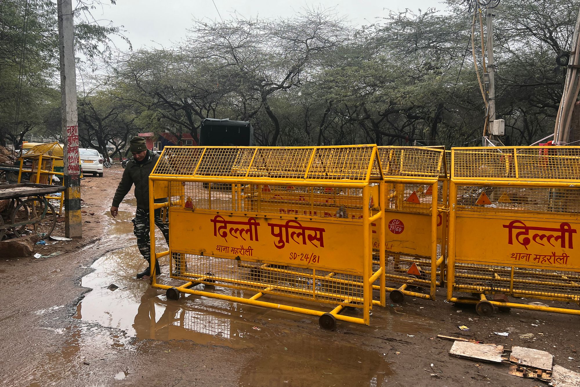 File. Paramilitary personnel seal off an entrance point to the site