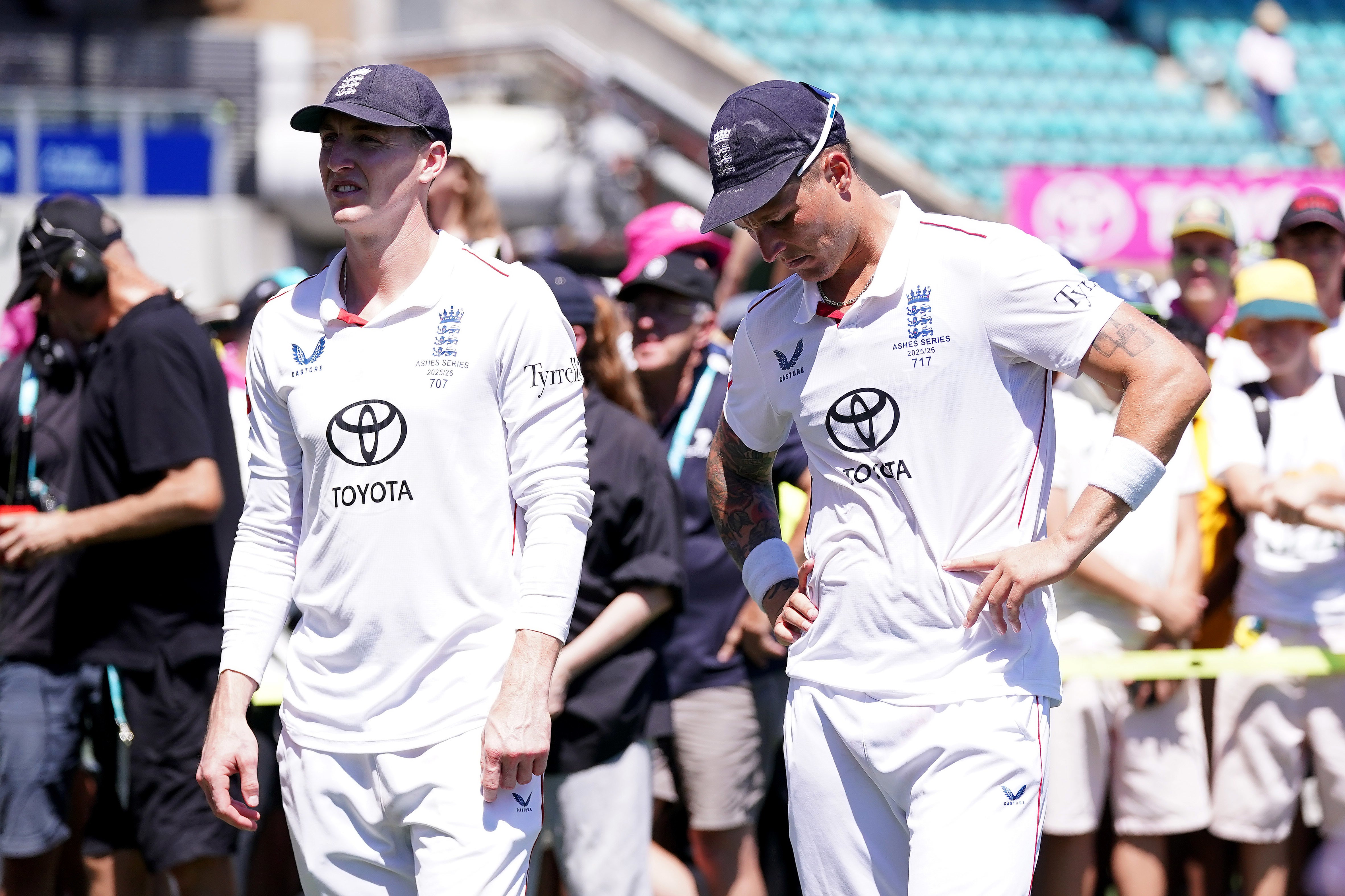 England’s Harry Brook (left) and Brydon Carse (right) reflect on an Ashes series defeat after a five-wicket loss in the final Test in Sydney (Robbie Stephenson/PA).