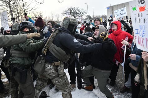 <p>Protestors clash with federal agents outside the Bishop Henry Whipple Federal Building in Saint Paul, Minnesota, on January 8, 2026</p>