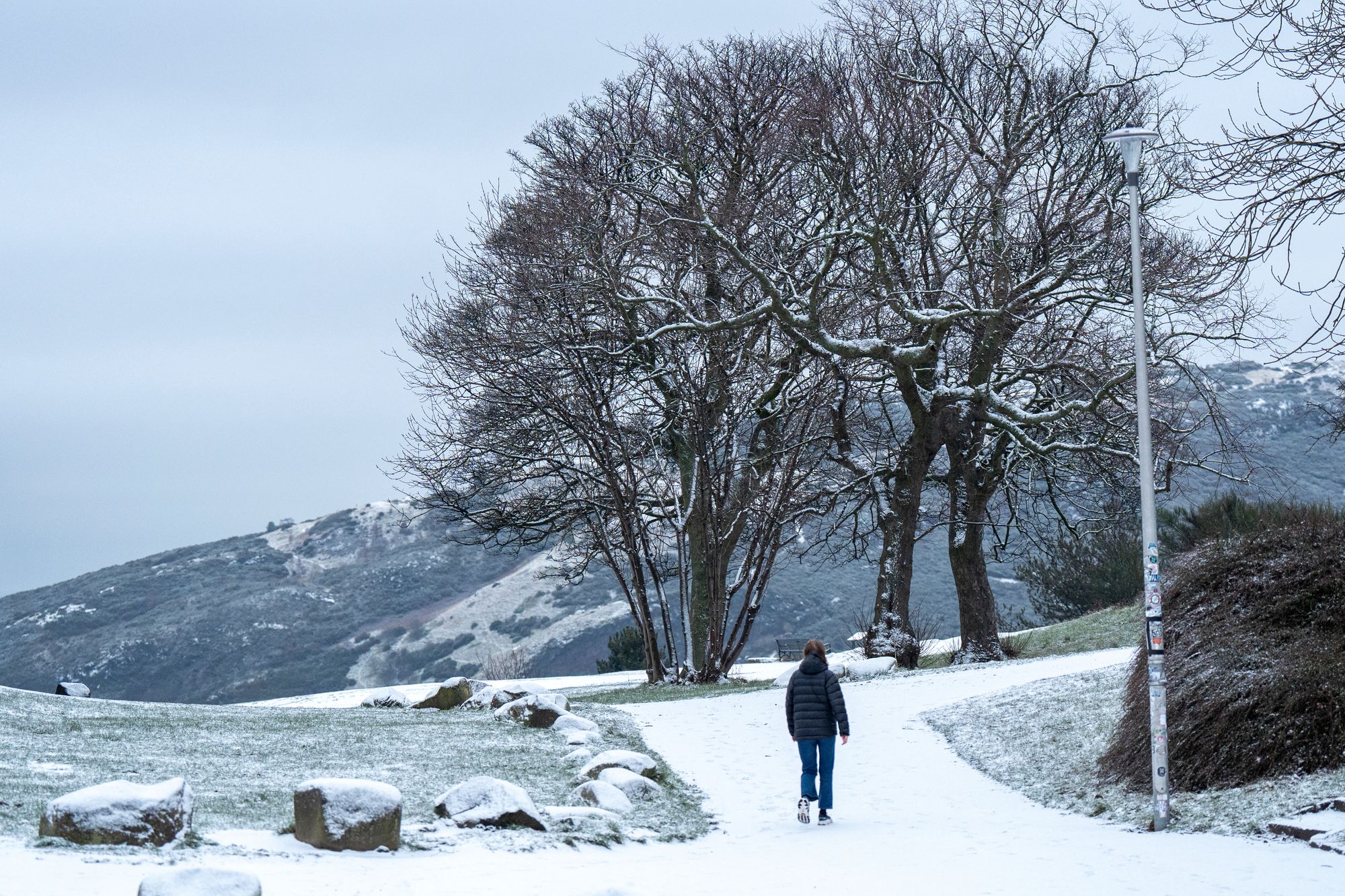 A person walks through the snow on Edinburgh's Calton Hill this week