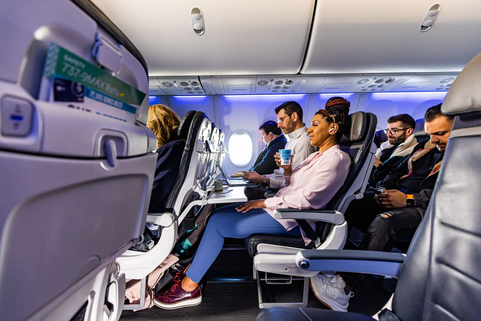<p>If you pick the right seat, you’ll discover that the Golden Age of flying isn’t actually over. Pictured is Alaska Airlines Premium Class</p>