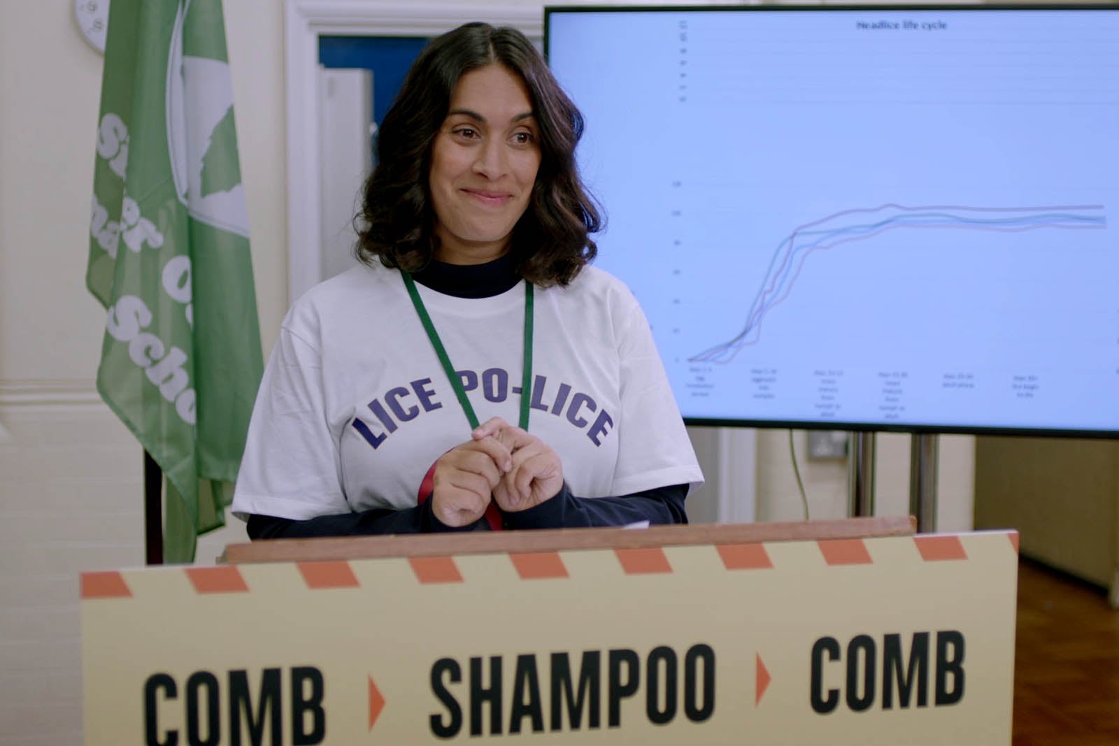 <p>‘Nit Blitz’: Laura (Emily Lloyd-Sani) helping to stop the spread of nits as it sweeps the school in BBC’s ‘Motherland’ in 2021</p>