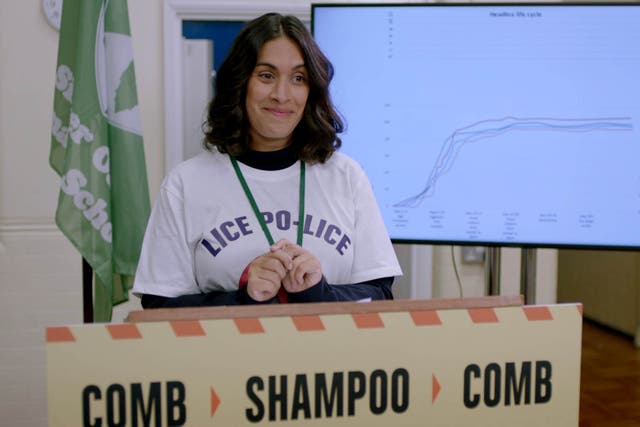 <p>‘Nit Blitz’: Laura (Emily Lloyd-Sani) helping to stop the spread of nits as it sweeps the school in BBC’s ‘Motherland’ in 2021</p>