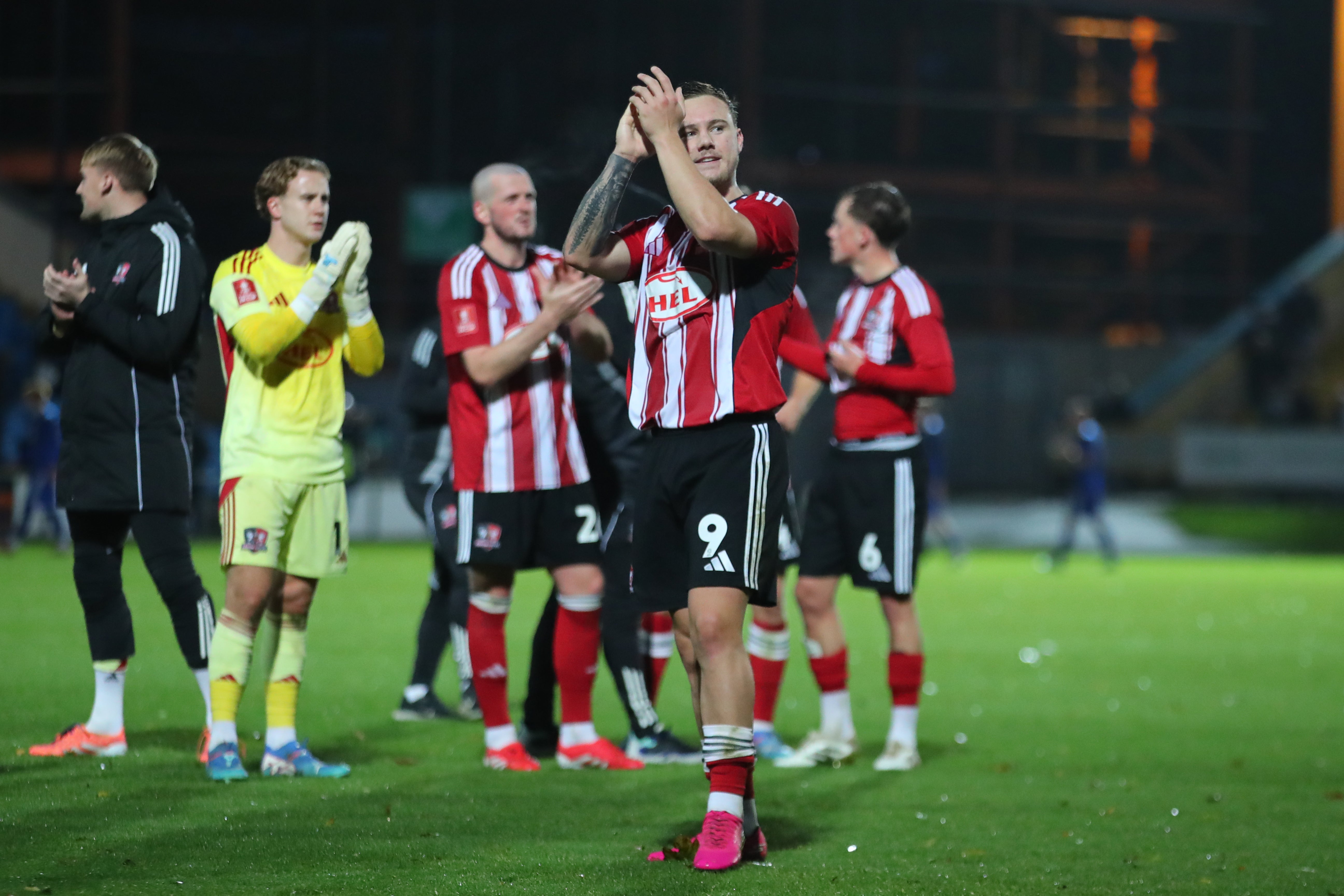 Jayden Wareham of Exeter City thanks the supporters after their FA Cup First Round win at Halifax Town
