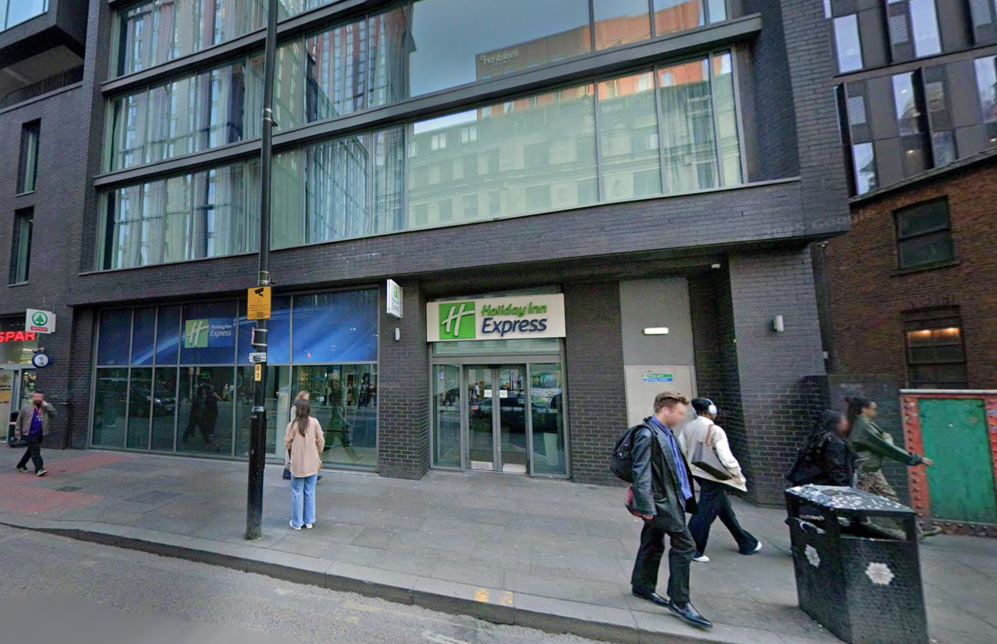 <p>The two men were turned away from the Holiday Inn Express in Manchester city centre</p>