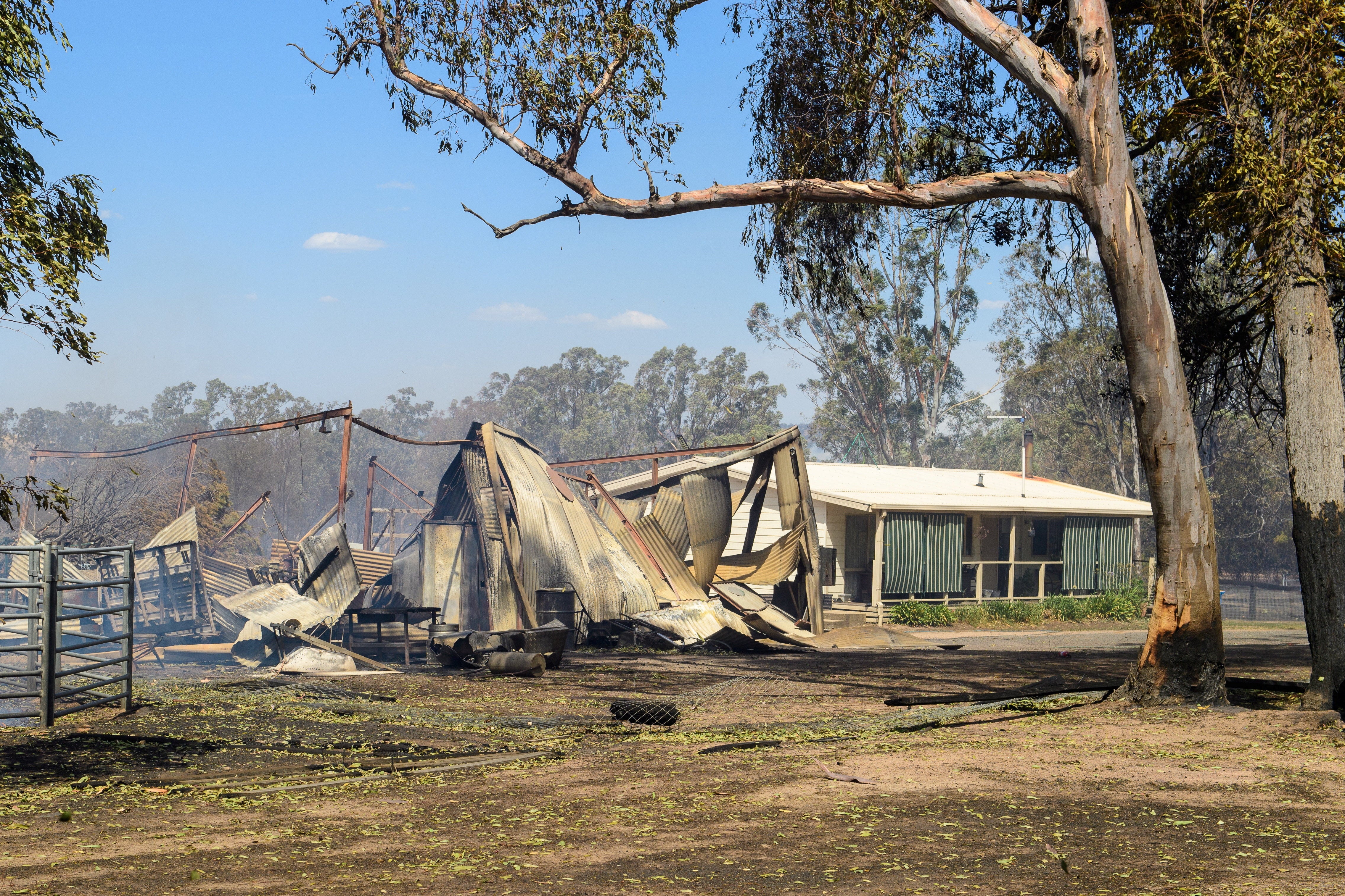A property destroyed by a bushfire stands in Longwood