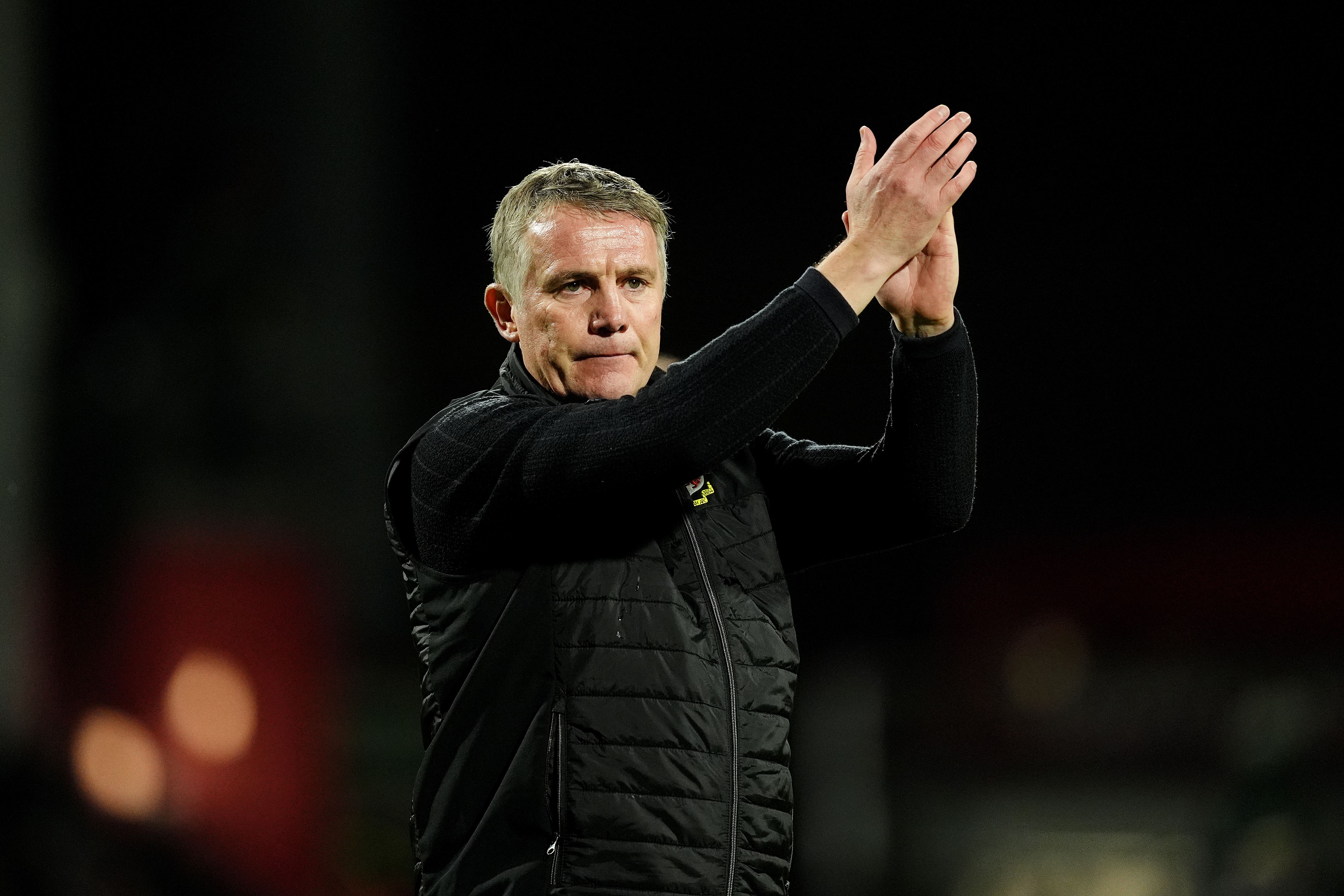Manager Phil Parkinson applauds Wrexham fans ahead of their FA Cup third-round tie against Nottingham Forest (Martin Rickett/PA)