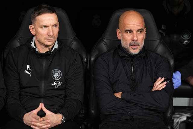 Manchester City assistant Pep Lijnders, left, wants City to reach numerous finals this season (Mike Egerton/PA)