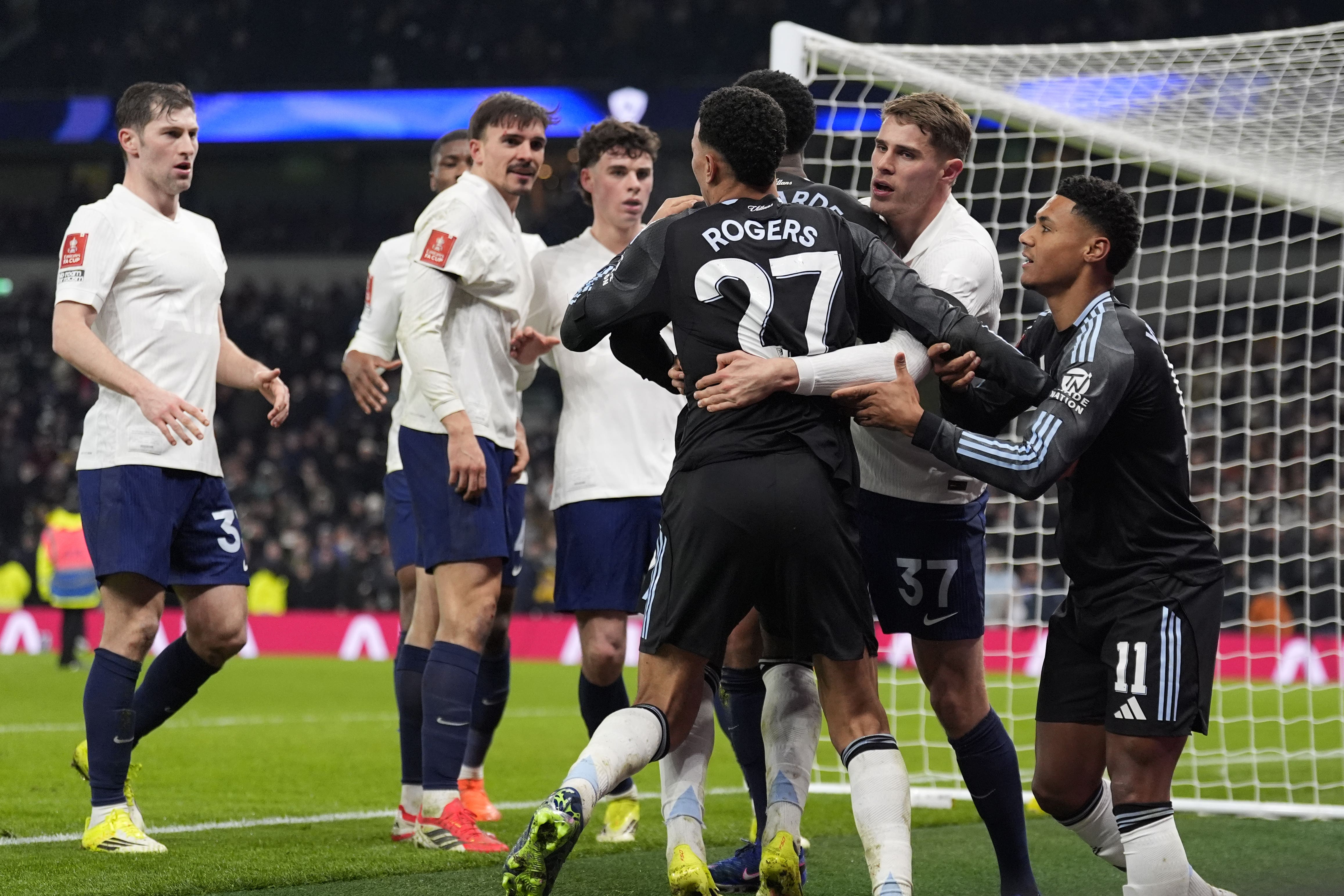 Tottenham and Aston Villa players clash after their FA Cup match (Andrew Matthews/PA)