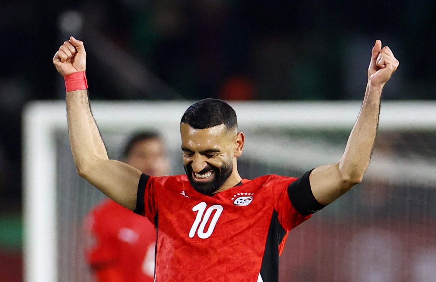 <p>Egypt's Mohamed Salah celebrates after the match</p>