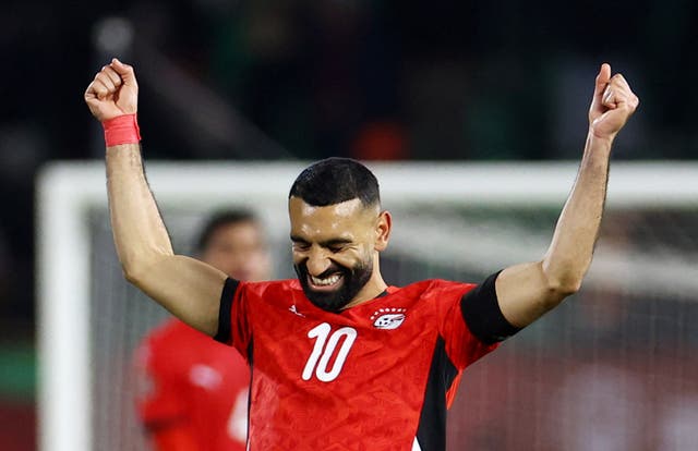 <p>Egypt's Mohamed Salah celebrates after the match</p>