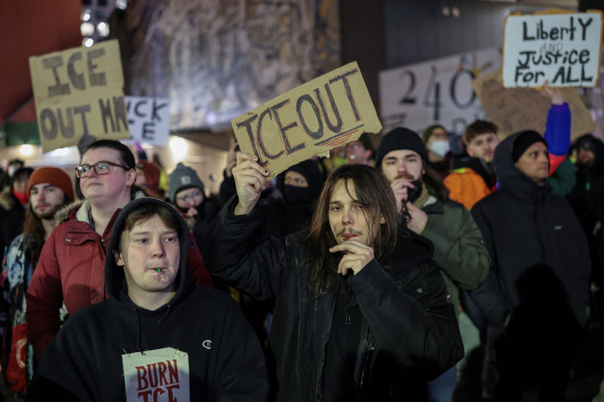 Anti-ICE protesters wave signs and blow whistles in Minneapolis two days after Renee Nicole Good was killed by an ICE agent