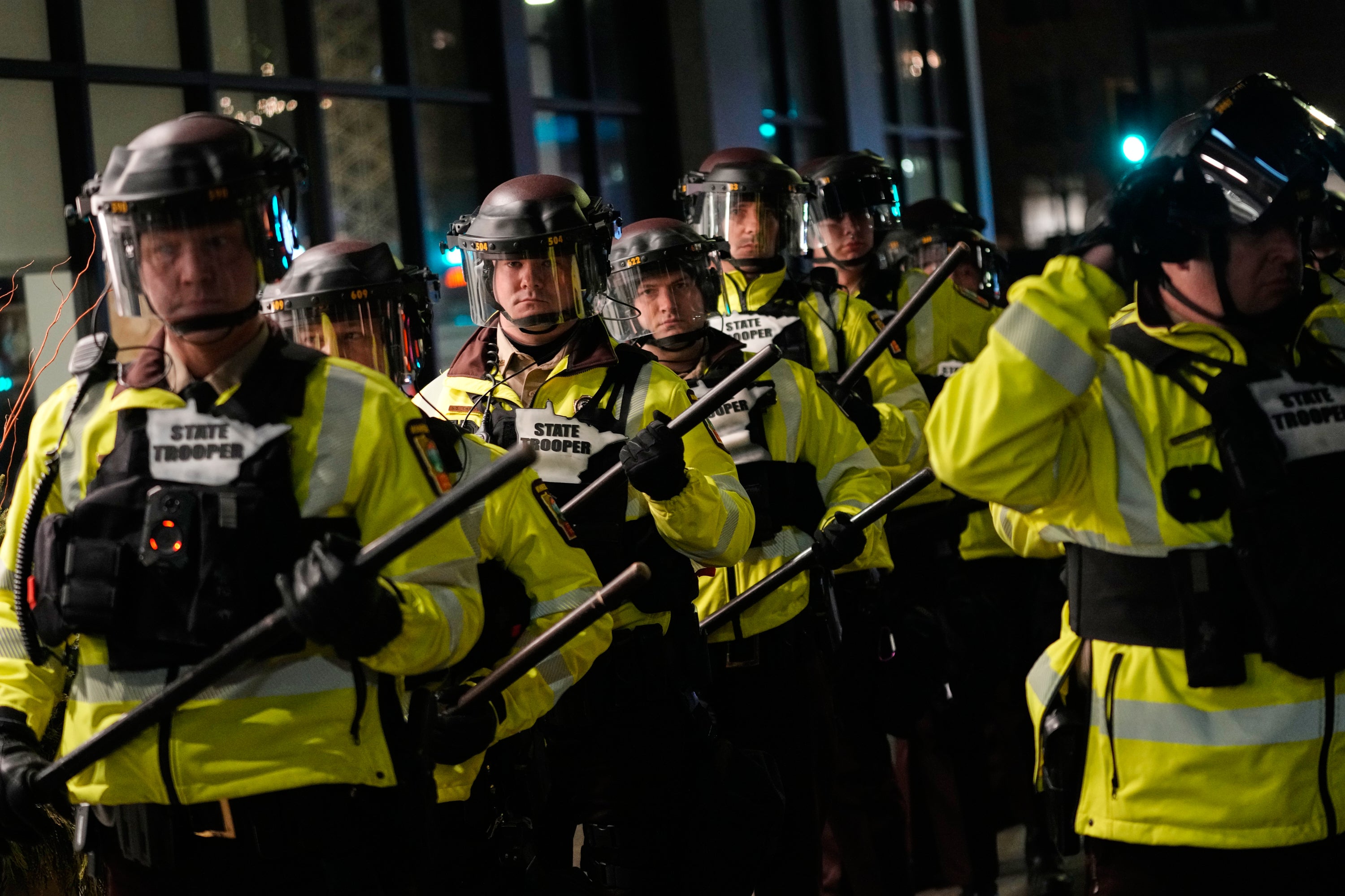 Minnesota State Patrol officers at the scene of an anti-ICE protest in downtownMinneapolis on Friday evening