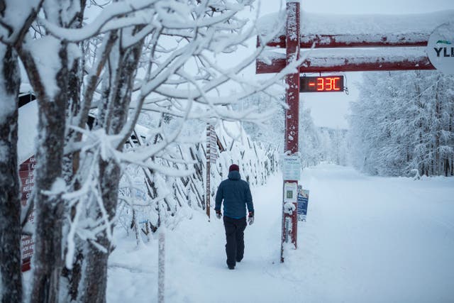 <p>A person walks past a digital display showing a temperature of minus 33 degrees Celsius (91 Fahrenheit) in Ylläs, Finland, Friday, Jan. 9, 2026. (Satu Renko/Lehtikuva via AP)</p>