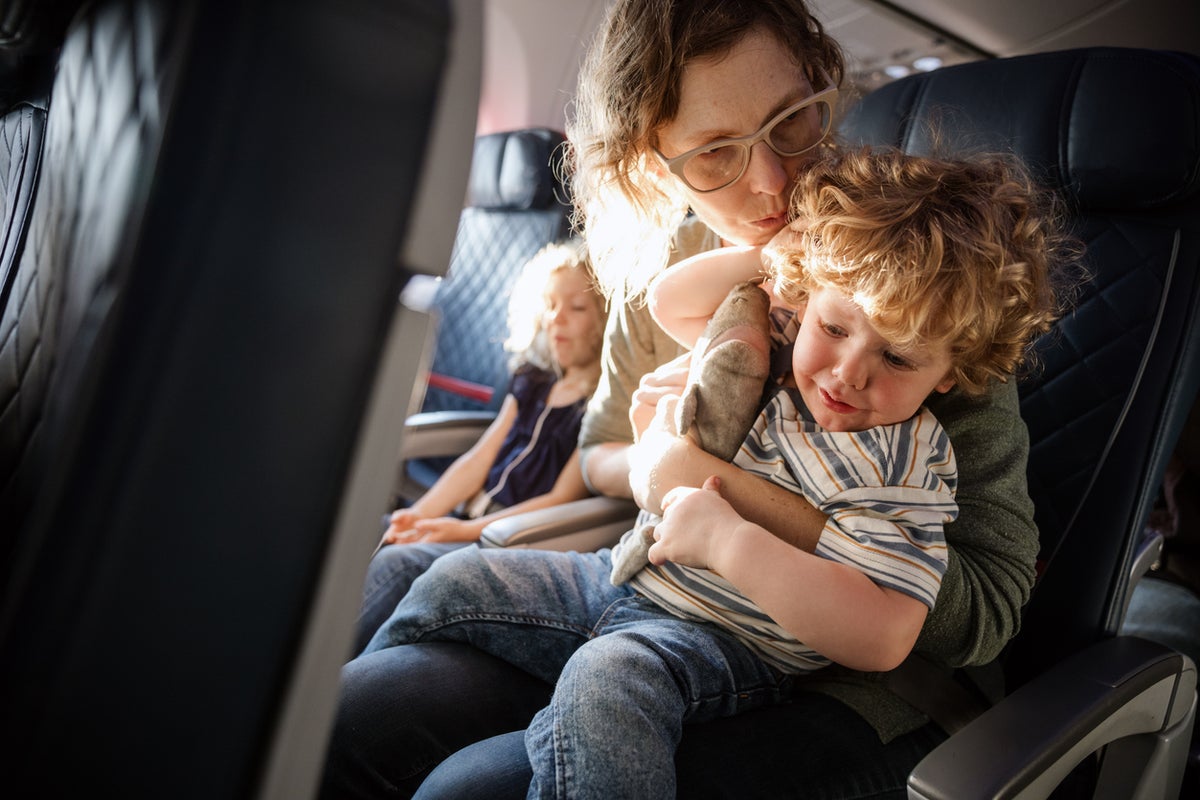 Don't moan about kids on flights – think about the parents