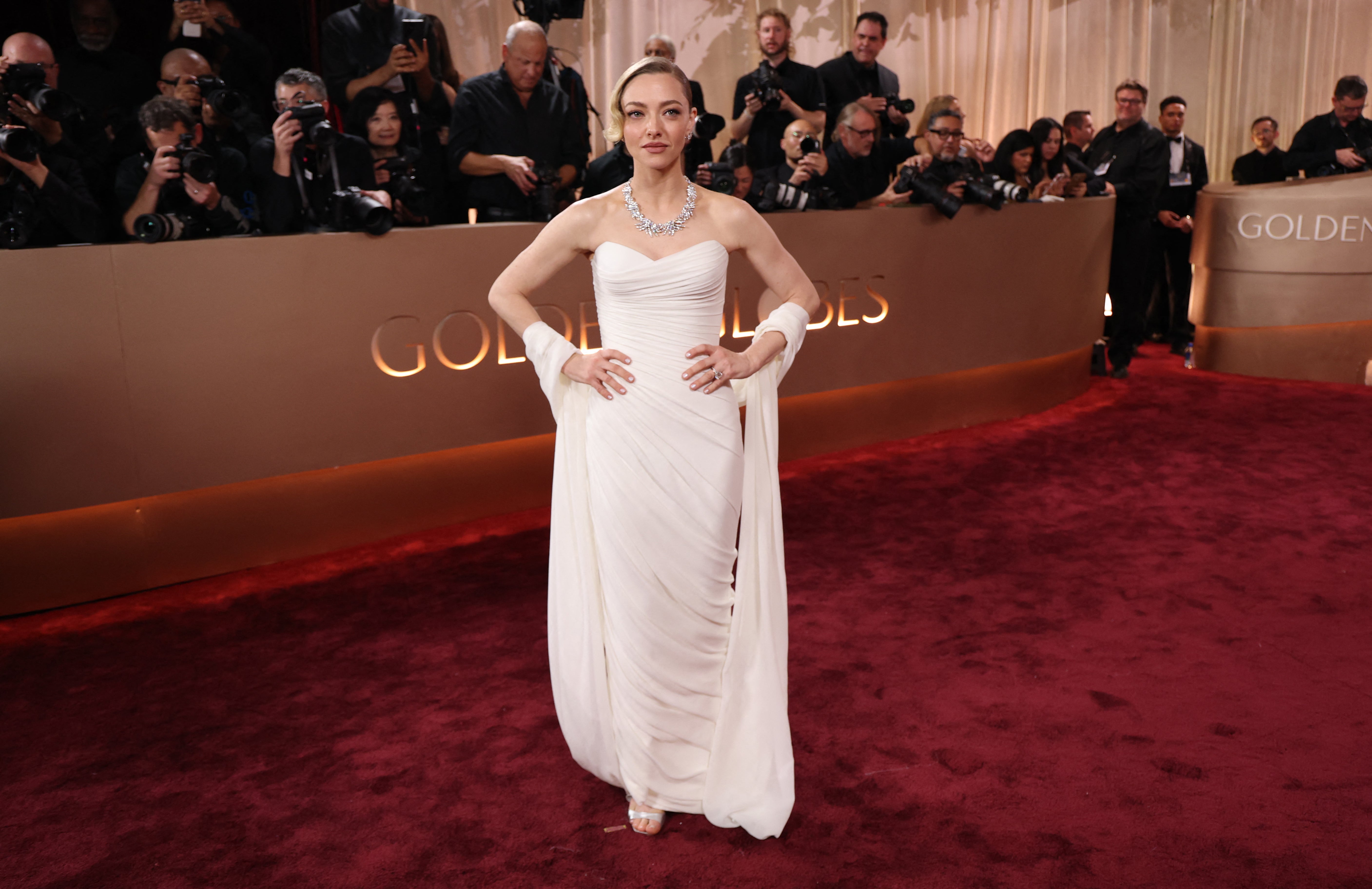 Amanda Seyfried cosplayed Marilyn Monroe in a white, strapless gown and a stunning statement diamond necklace