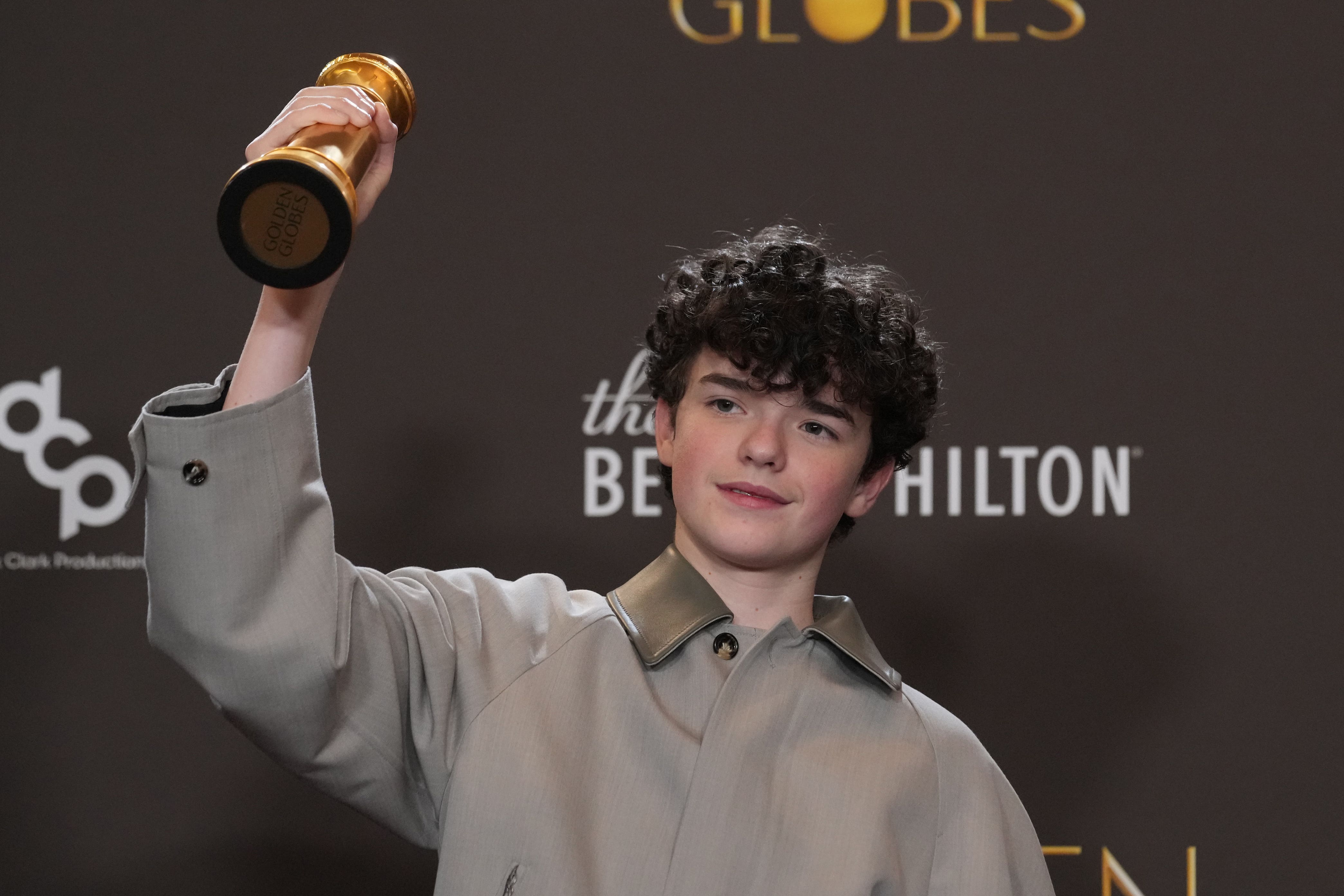 Owen Cooper with his Golden Globe award