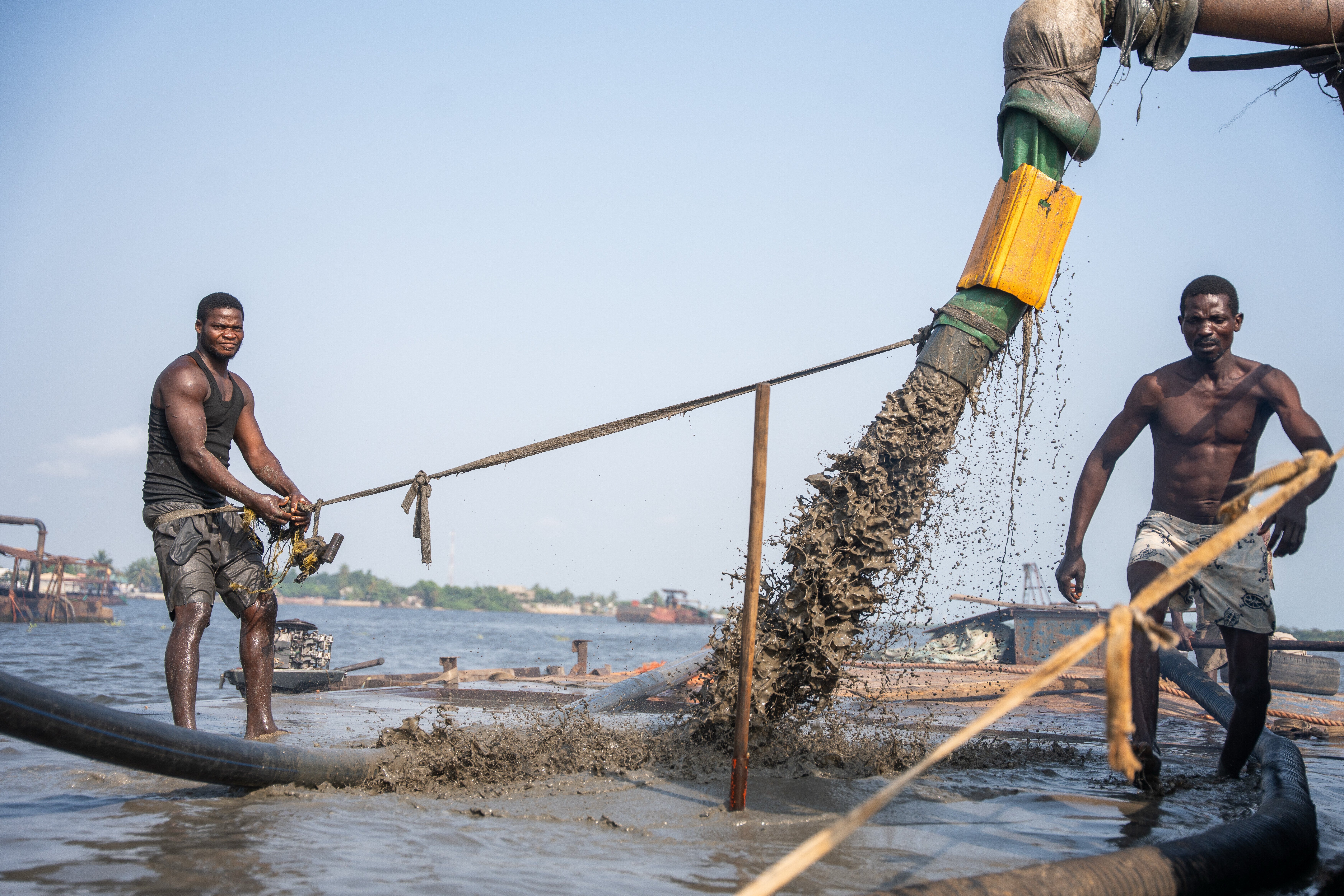 Sand extraction in progress in Lagos waters, Saturday, Dec. 6, 2025. (AP Photo/Grace Ekpu)