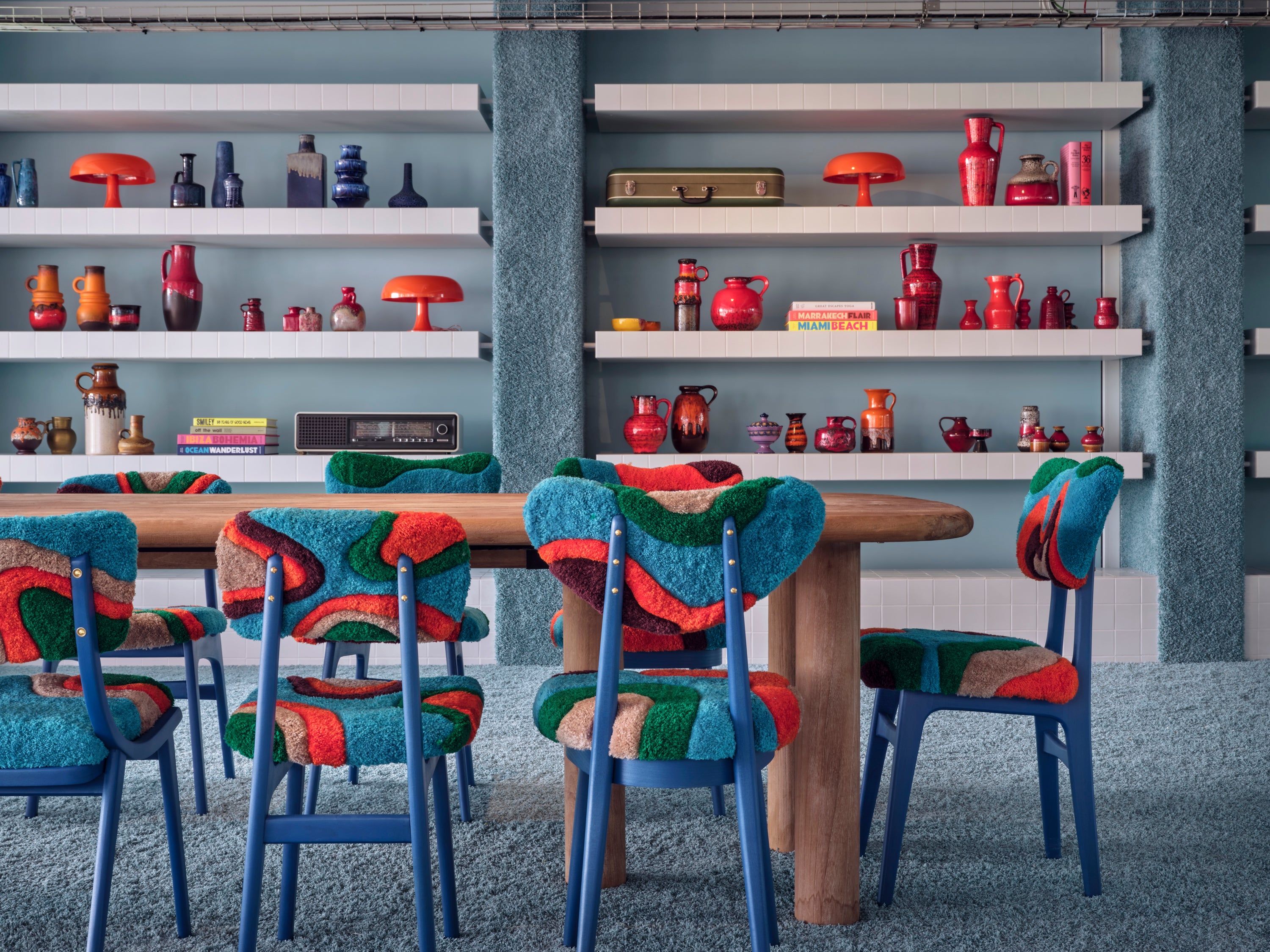 The pool room – formerly a public poolhouse – is full of bold patterns and colours