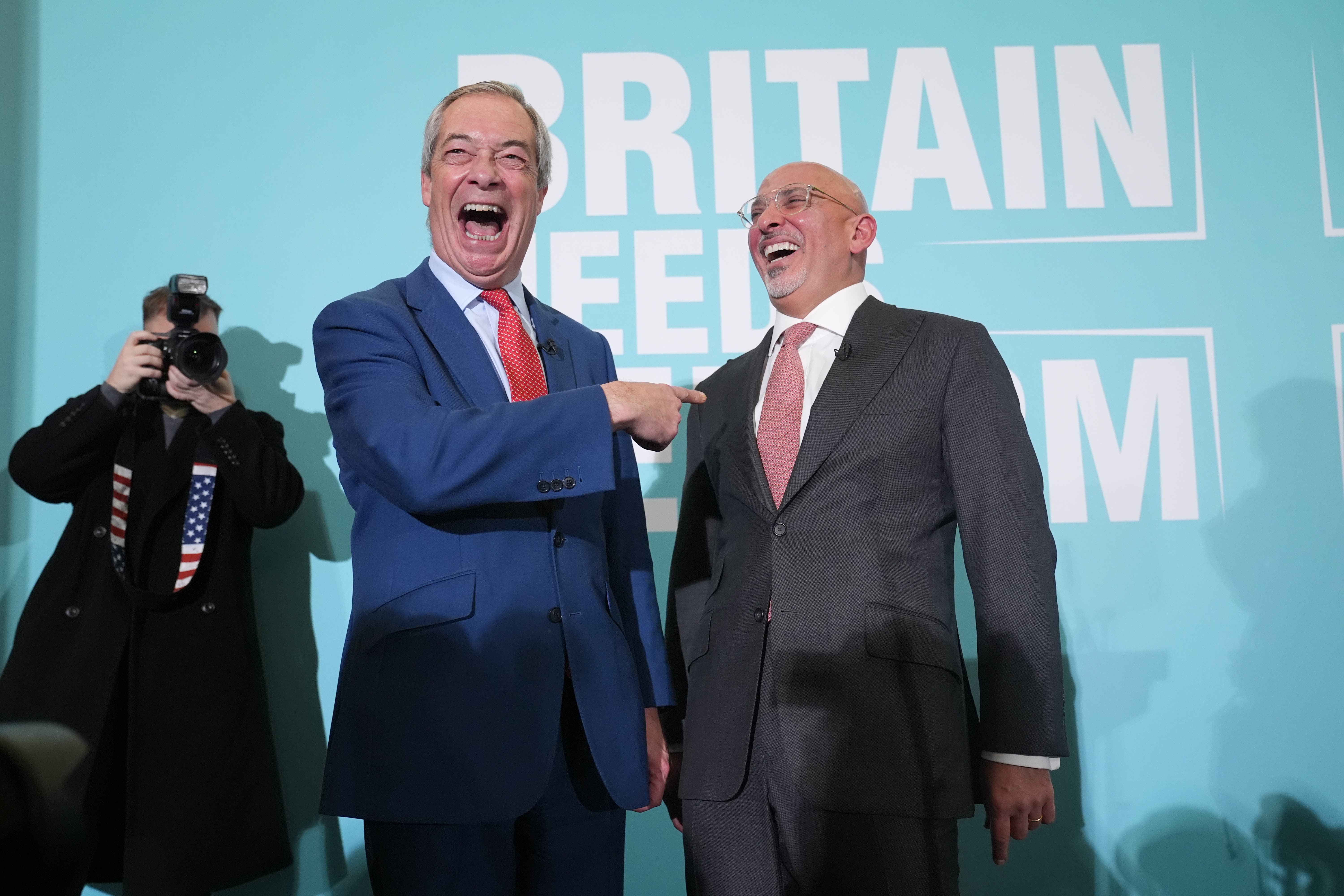 Nigel Farage, left, with Nadhim Zahawi (Lucy North/PA)