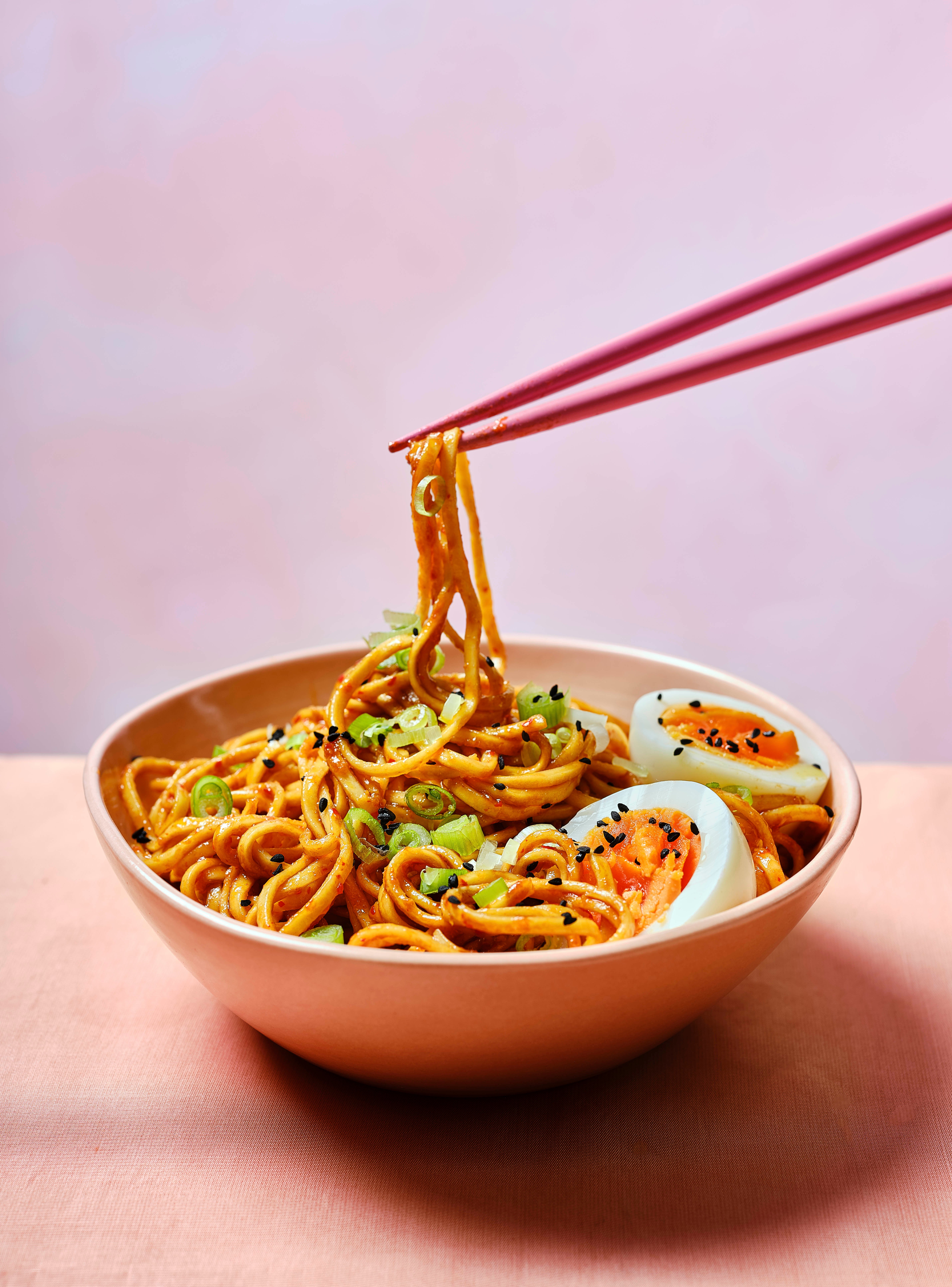 ’A bowl of umami-rich noodles is more than just food; it’s a shield against the damp, a salve for the weary’