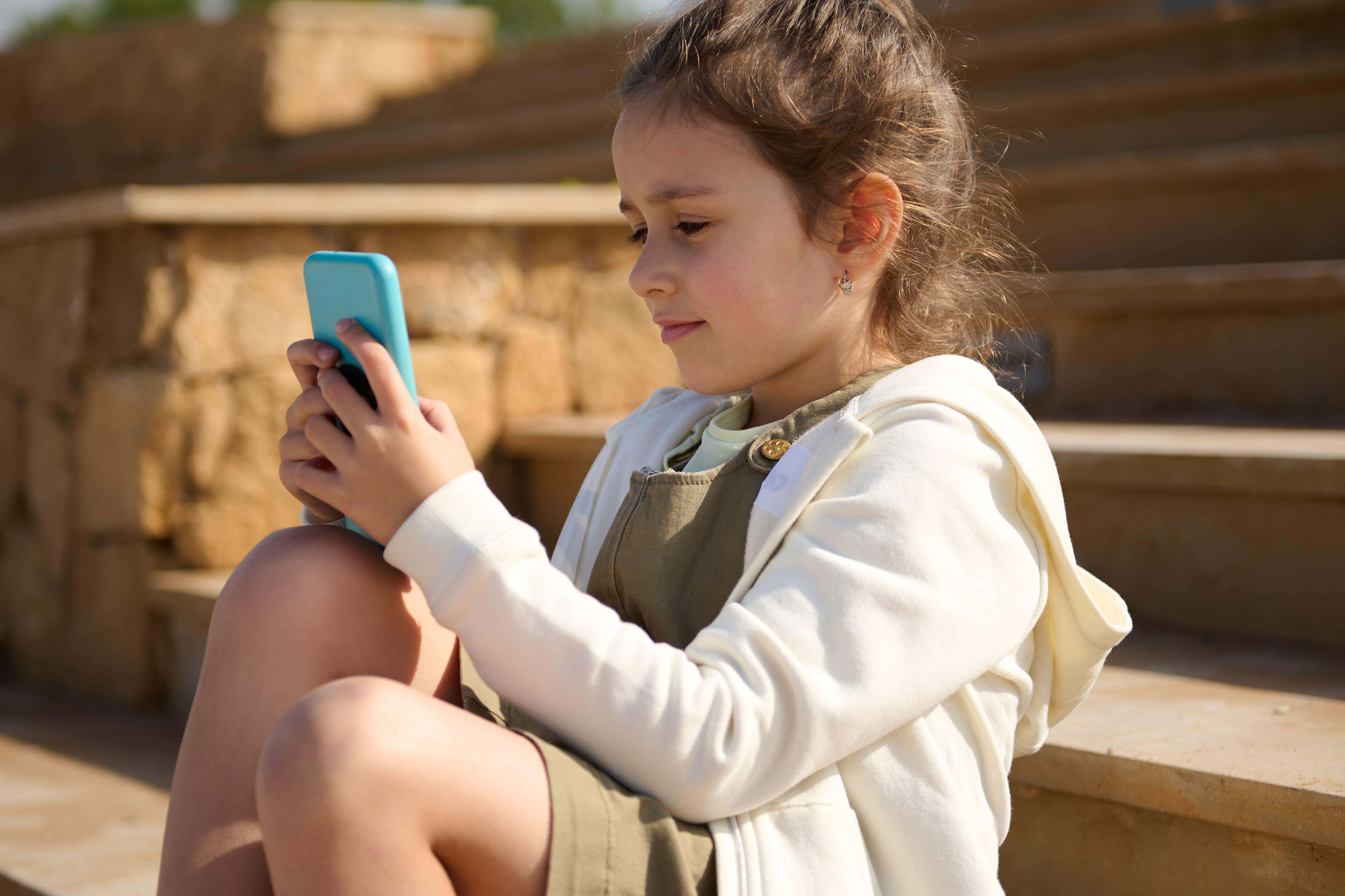 Government research has found that children aged two with the highest screen use – about five hours a day – could say significantly fewer words than those with screen use of about 44 minutes a day (Alamy/PA)