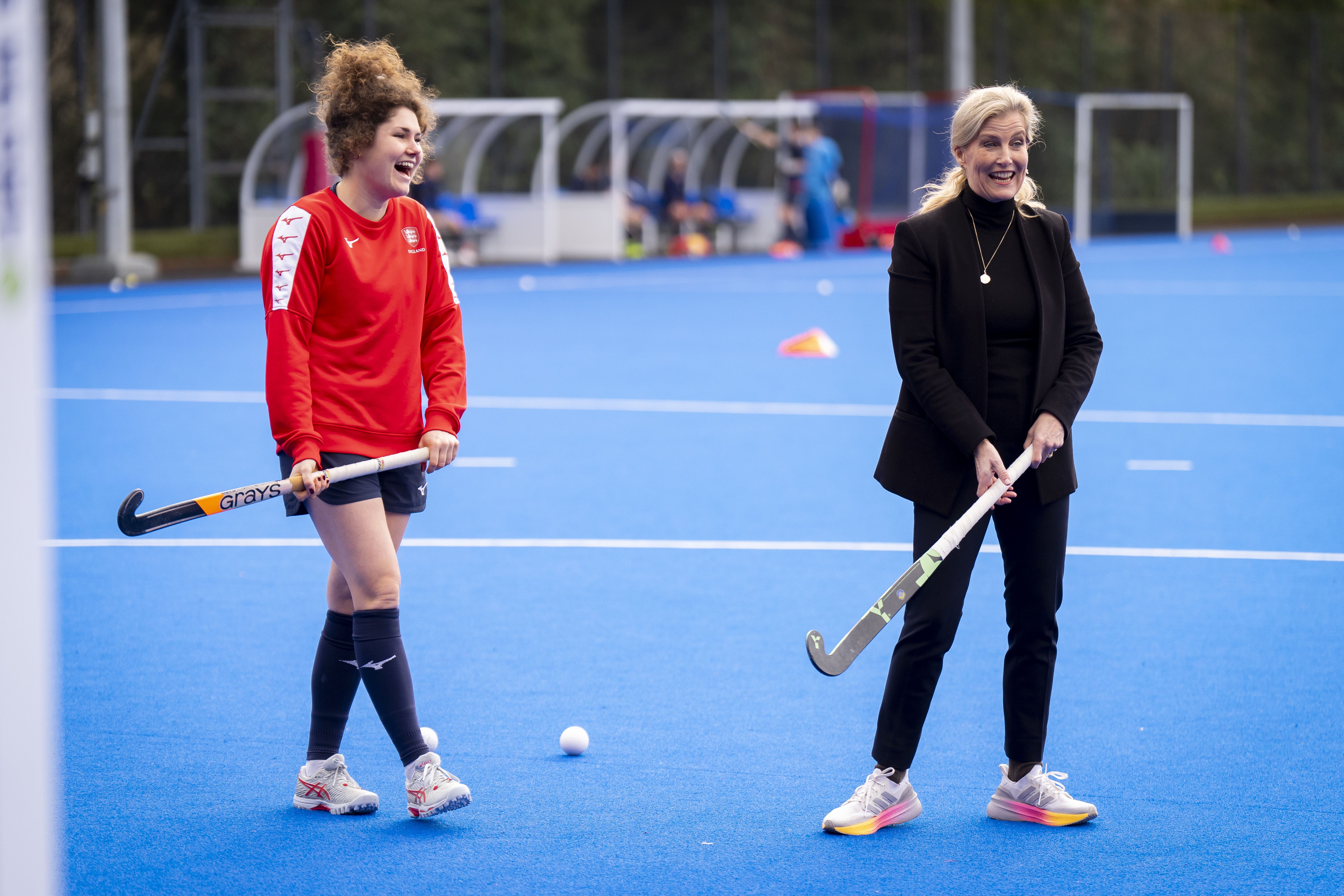 The Duchess of Edinburgh with Holly Hunt during a visit to England Hockey (Aaron Chown/PA)