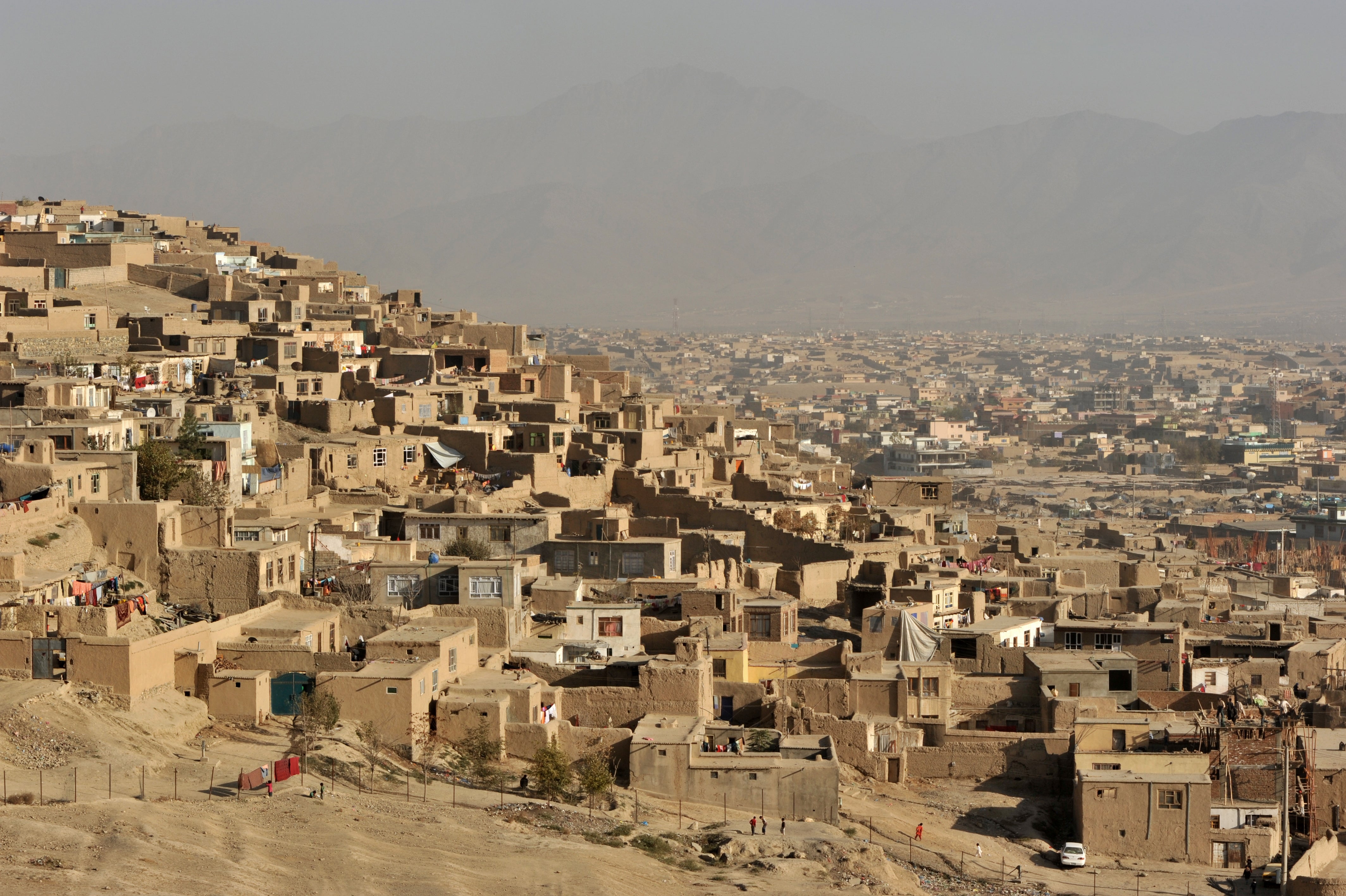 Afghanistan is one of 22 countries that Americans are told to avoid altogether. Pictured is the capital, Kabul