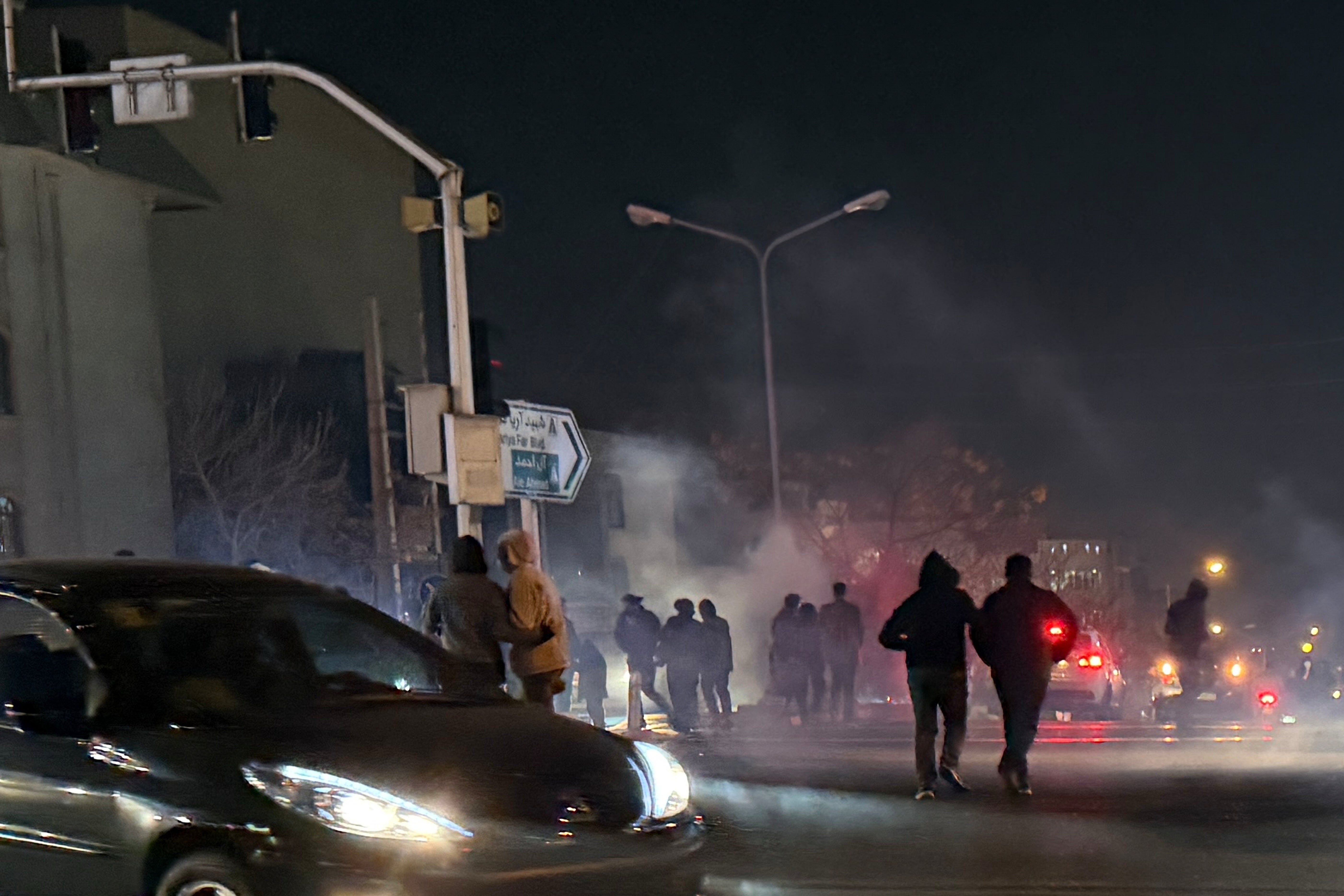 Tear gas being fired during an anti-government protest in Tehran