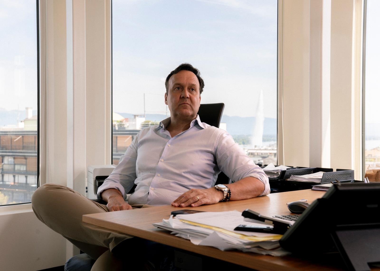 Oil trader Niels Troost, seen here in his Geneva office, was forced to liquidate his company following his ill-fated partnership with 'fake spy' Gaurav Srivastava, according to a new lawsuit