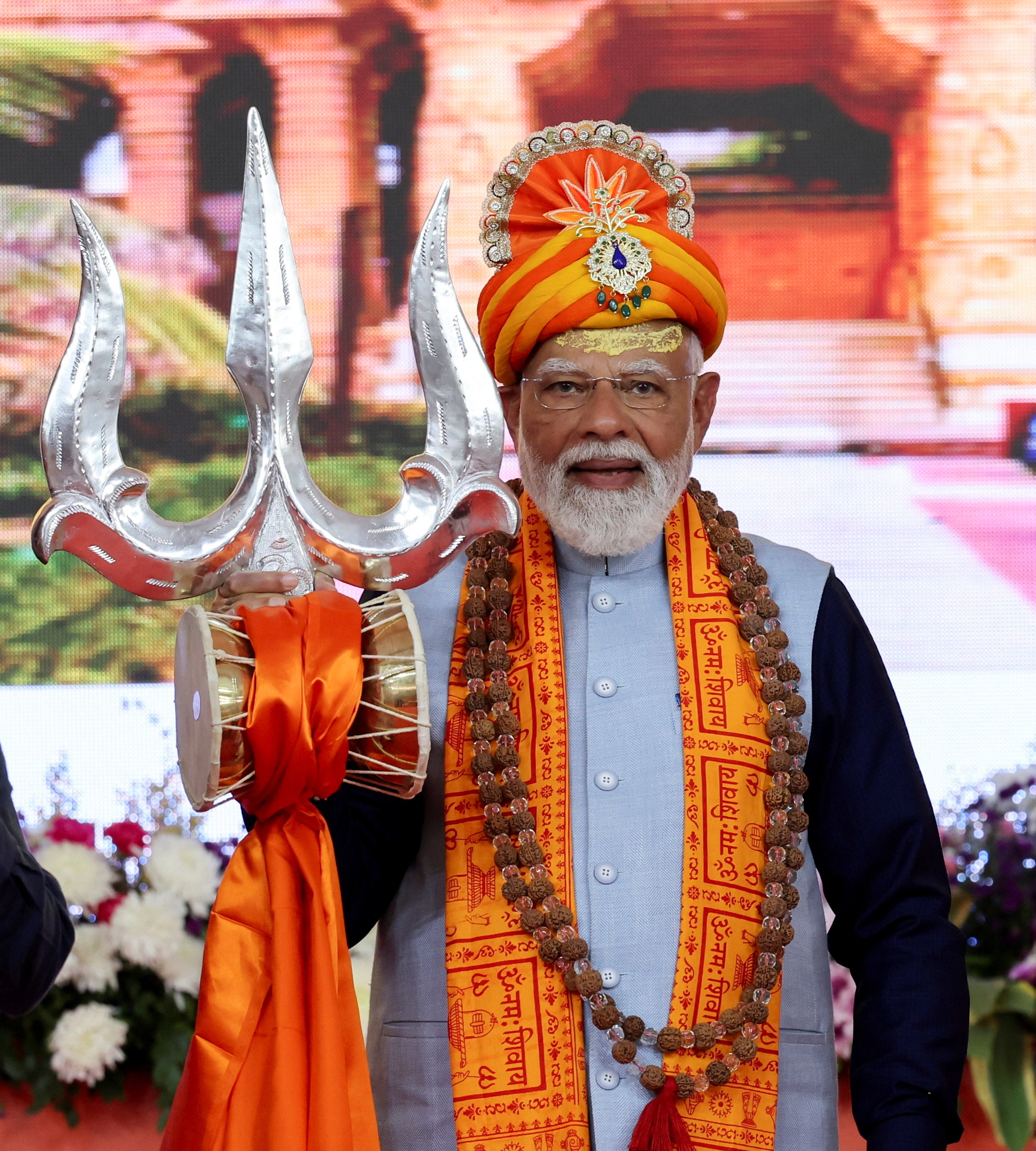 <p>India’s prime minister, Narendra Modi, holds a <em>Trishul</em>, one of the weapons used by the Hindu deity Lord Shiva, while attending the Somnath Swabhiman Parv celebrations at Somnath Temple in Gujarat, India, 11 January 2026</p>
