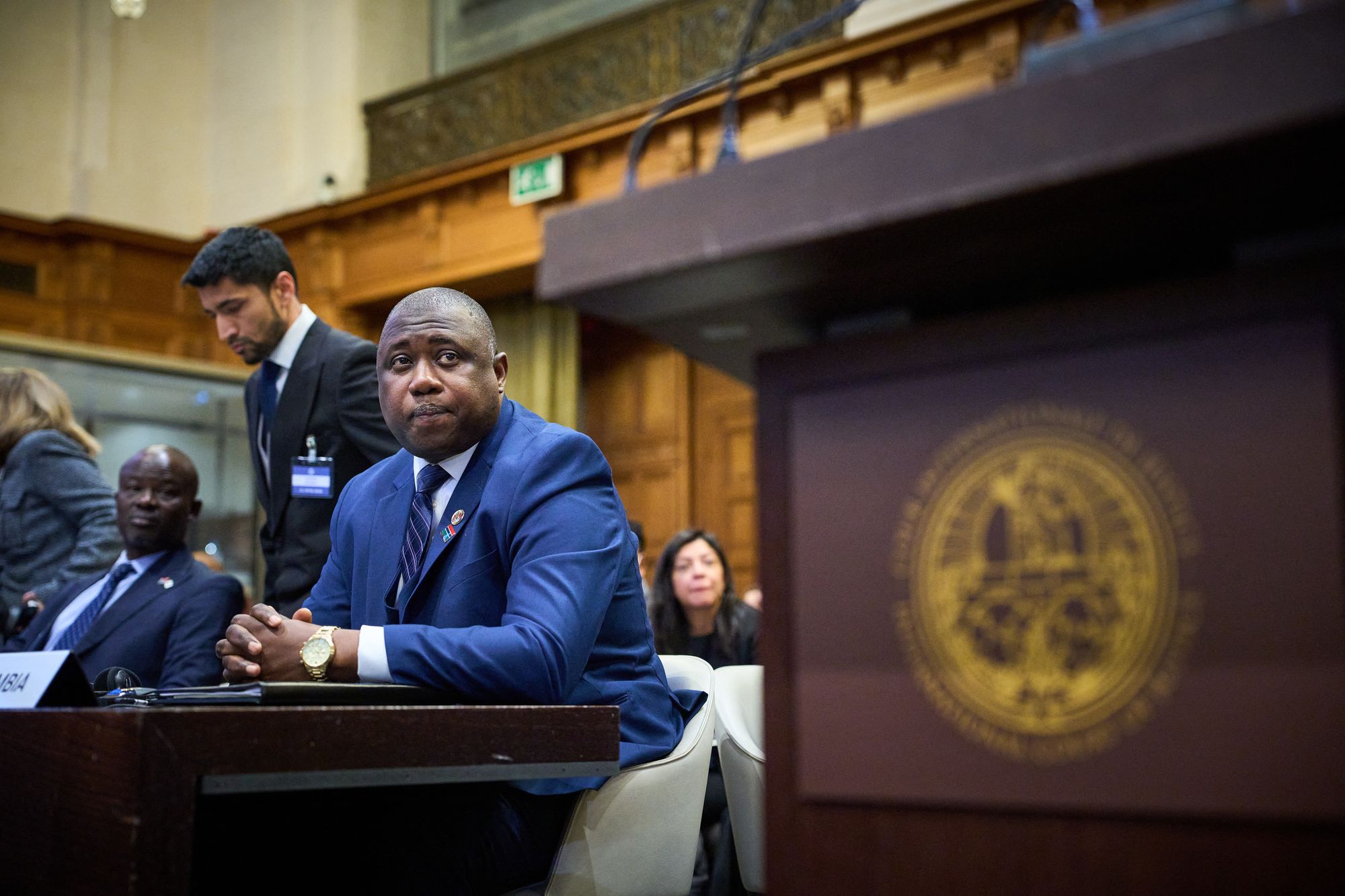 Dawda Jallow waits for the start of the first hearing in the Myanmar genocide case at the ICJ in the Hague
