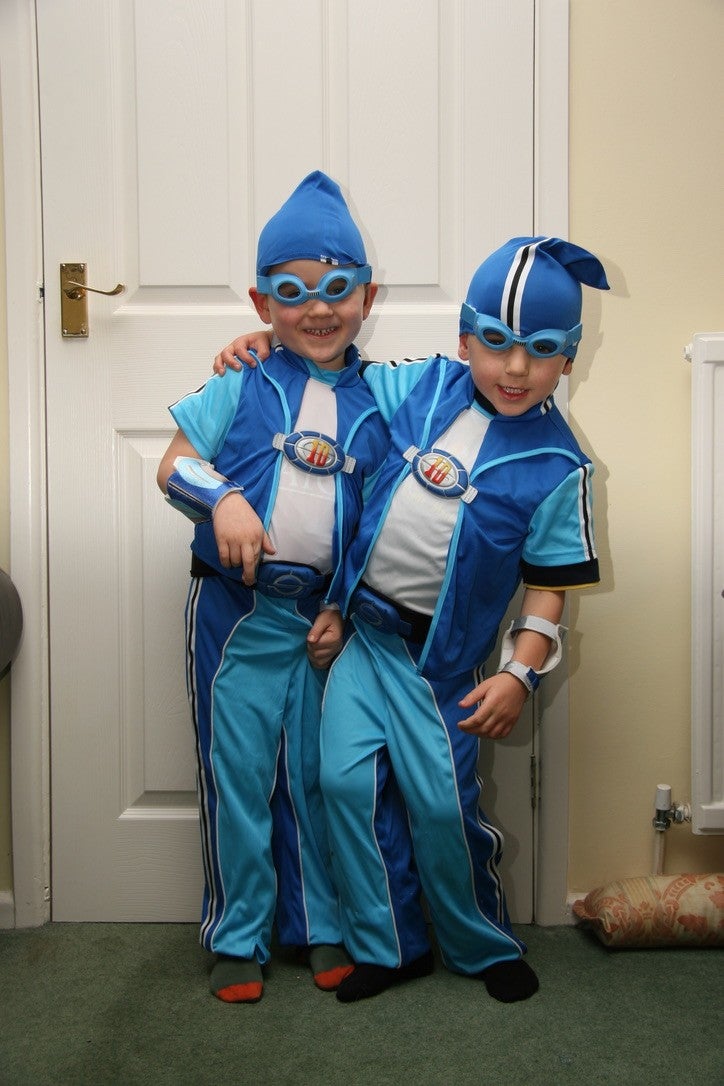 Mr Prigg (L) dressed up with his brother as a child