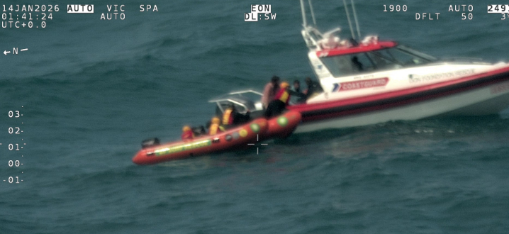 <p>Crews combed a large area for hours before spotting the men in the water </p>