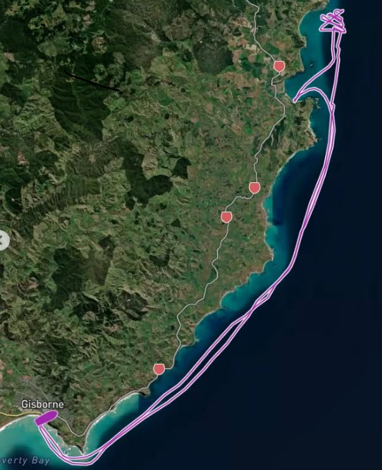 Rescue workers began searching for three men after their aluminium vessel became entangled in a craypot line and overturned off Tolaga Bay