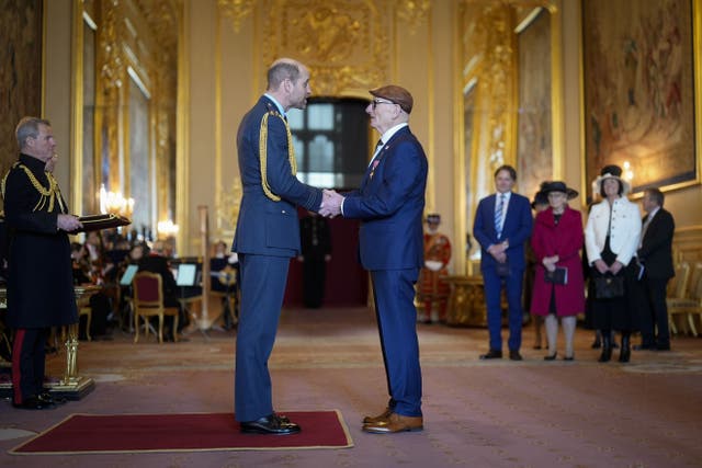 Frank Rothwell, from Oldham, is honoured by the Prince of Wales (Aaron Chown/PA)