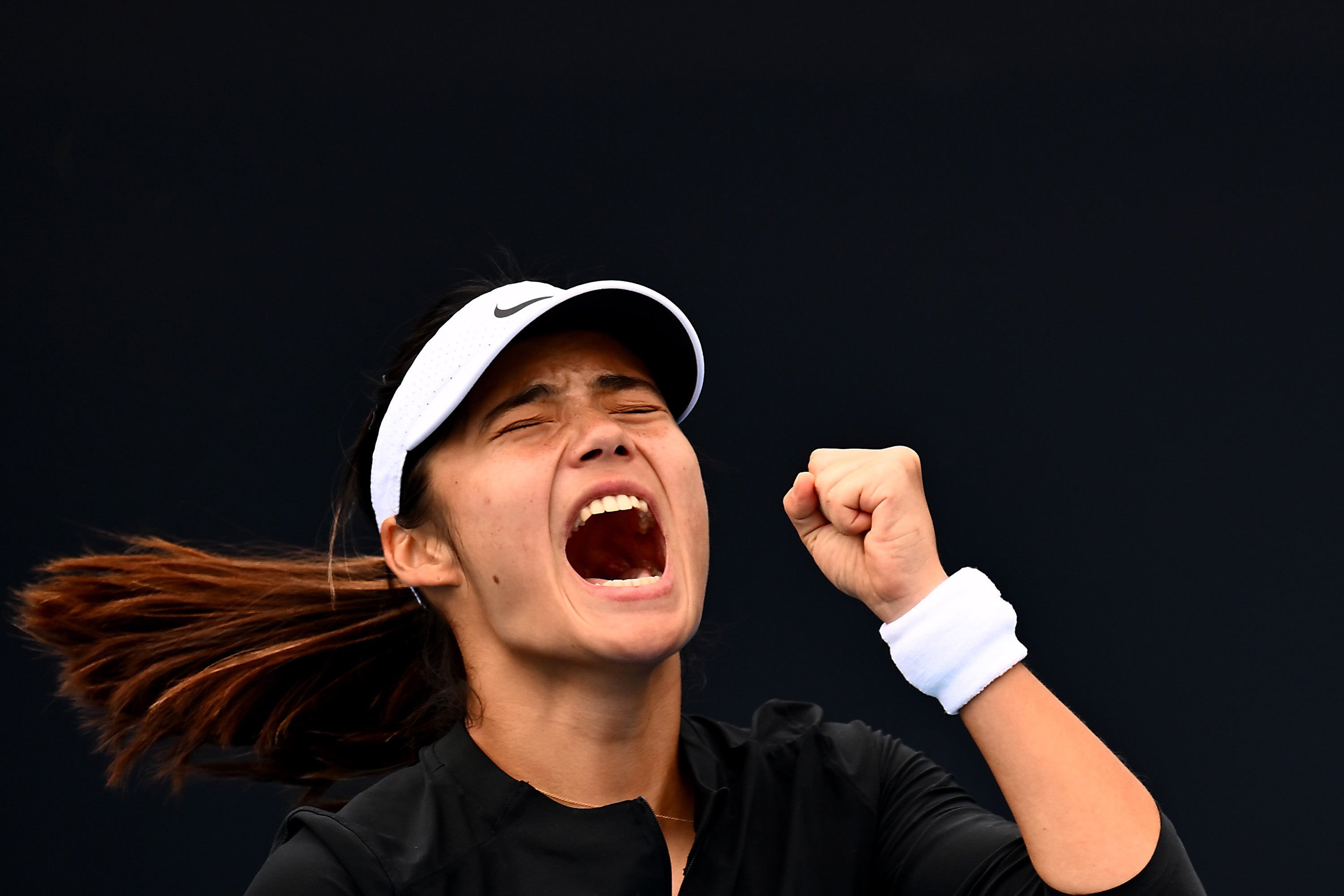 <p>Emma Raducanu celebrates winning her match against Camila Osorio</p>