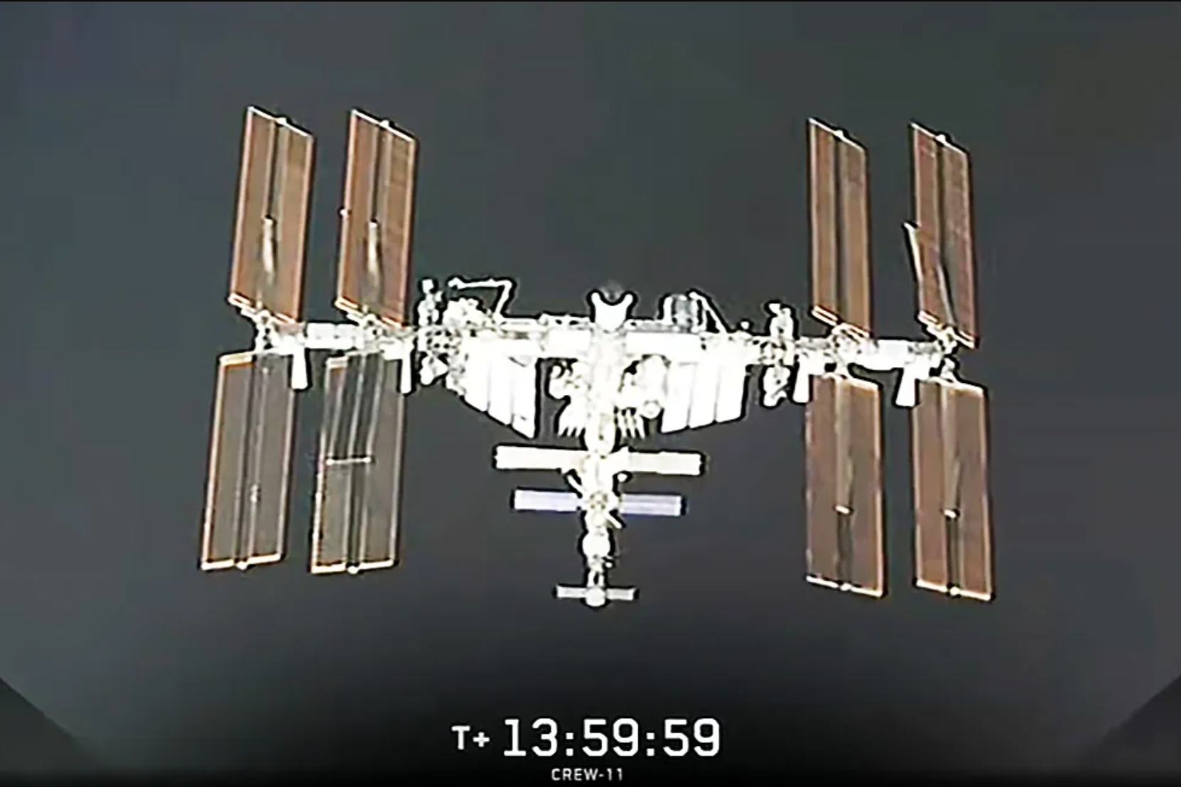 The International Space Station is viewed from the SpaceX Dragon during its approach carrying four Nasa SpaceX Crew-11 members