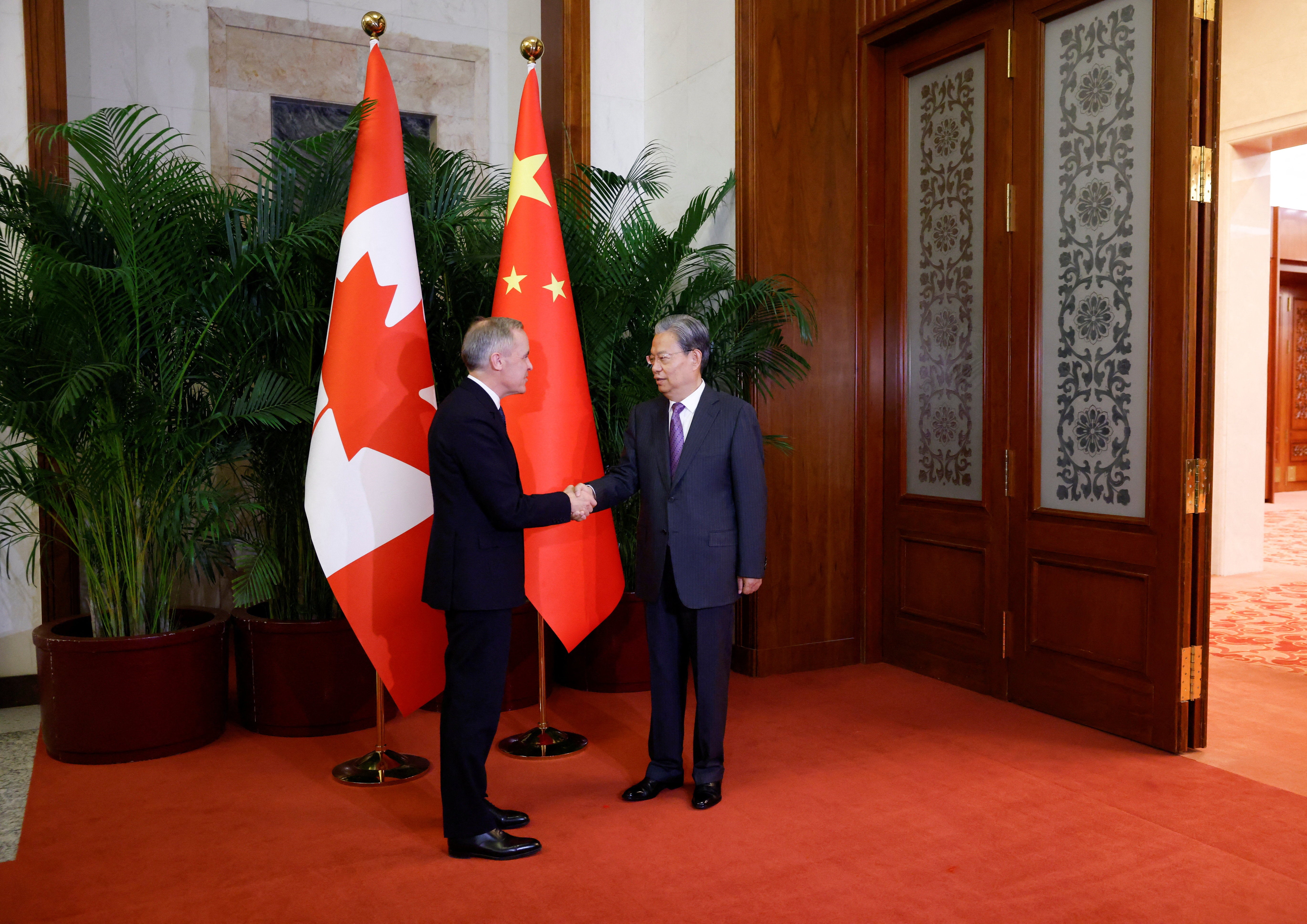 Carney meets chair of the Standing Committee of the National People’s Congress of China Zhao Leji, during the first visit by a Canadian PM to China since 2017 at the Great Hall of the People, in Beijing, on Thursday