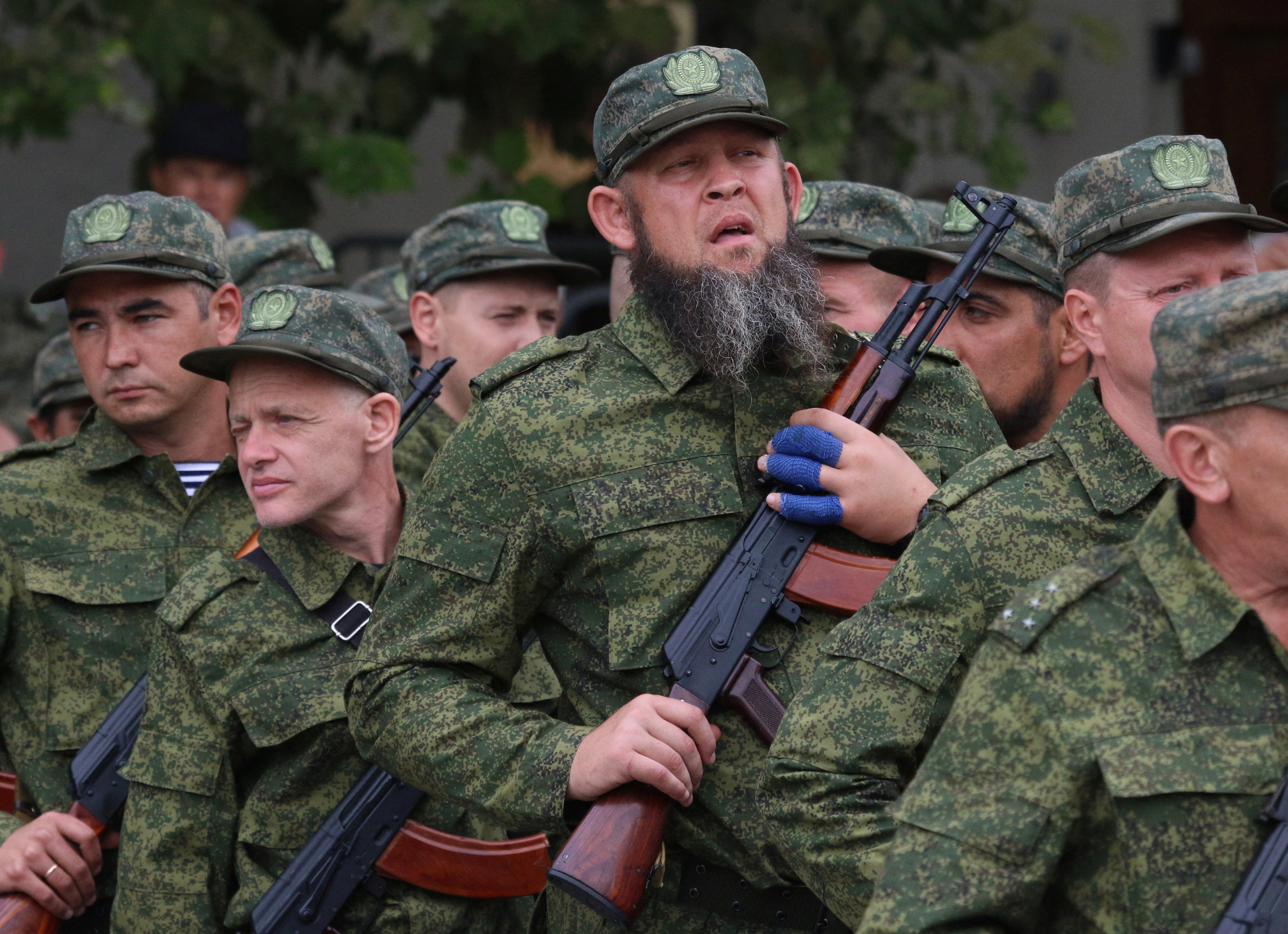 <p>Reservists drafted during the partial mobilisation attend a ceremony before departure for military bases, in Sevastopol, Crimea</p>