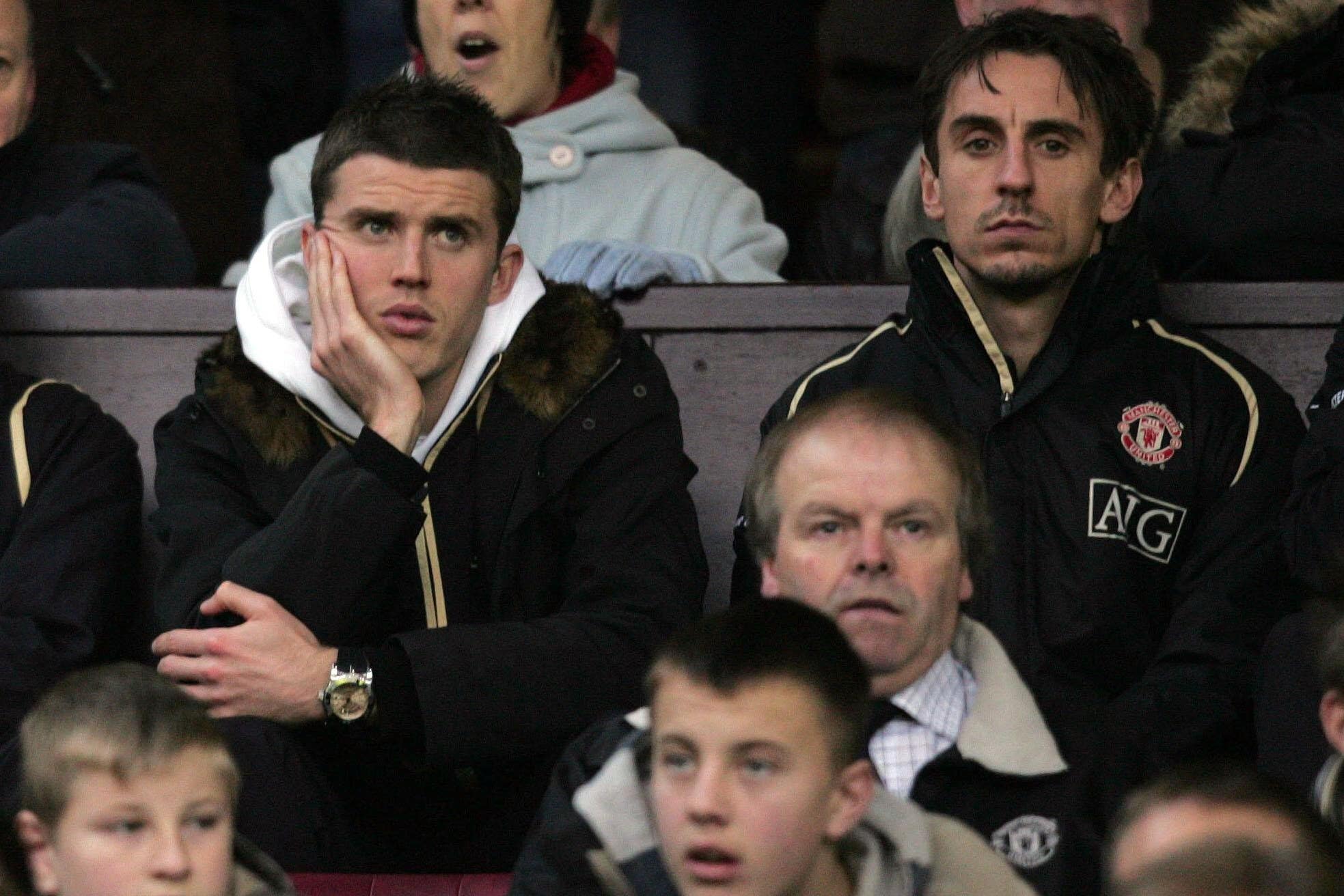 Gary Neville (right) says Michael Carrick’s role cannot continue after this season (Martin Rickett/PA)
