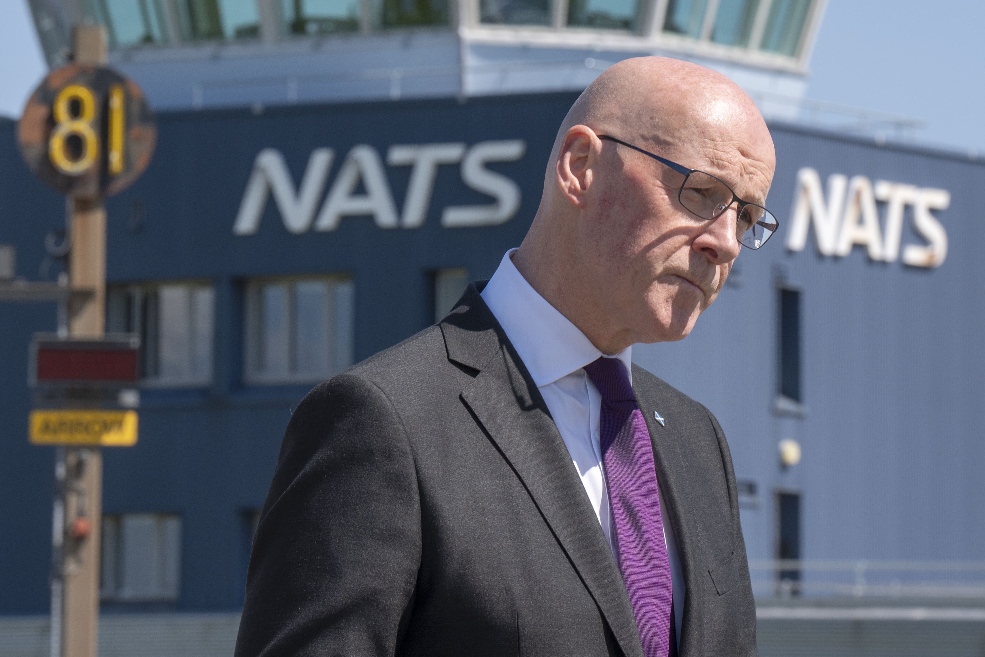 John Swinney said he will ensure Scottish Government-owned airports are used in accordance with international law (Jane Barlow/PA)