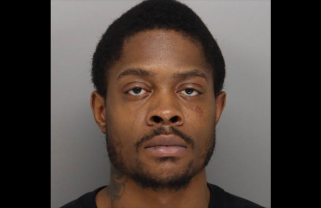 <p>Ronell Scott, 25, was charged with murder over the death of 20-year-old TreShawn Smith in October 2022, with a warrant put out for his arrest last April</p>