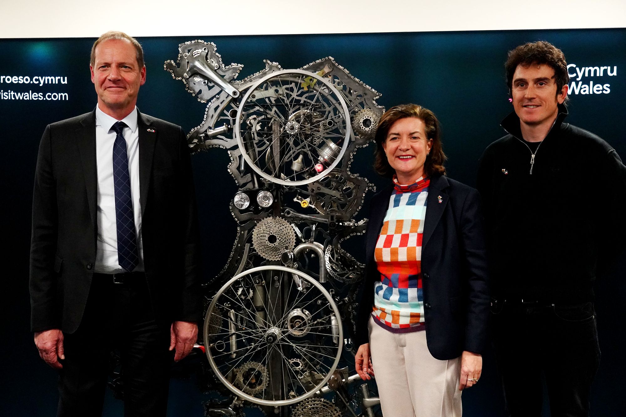 <p>First Minister of Wales Eluned Morgan (centre), Tour de France 2018 winner Geraint Thomas (right), and Director of the Tour de France Christian Prudhomme during the Tour de France 2027 Grand Depart route reveal at the Senedd in Cardiff</p>